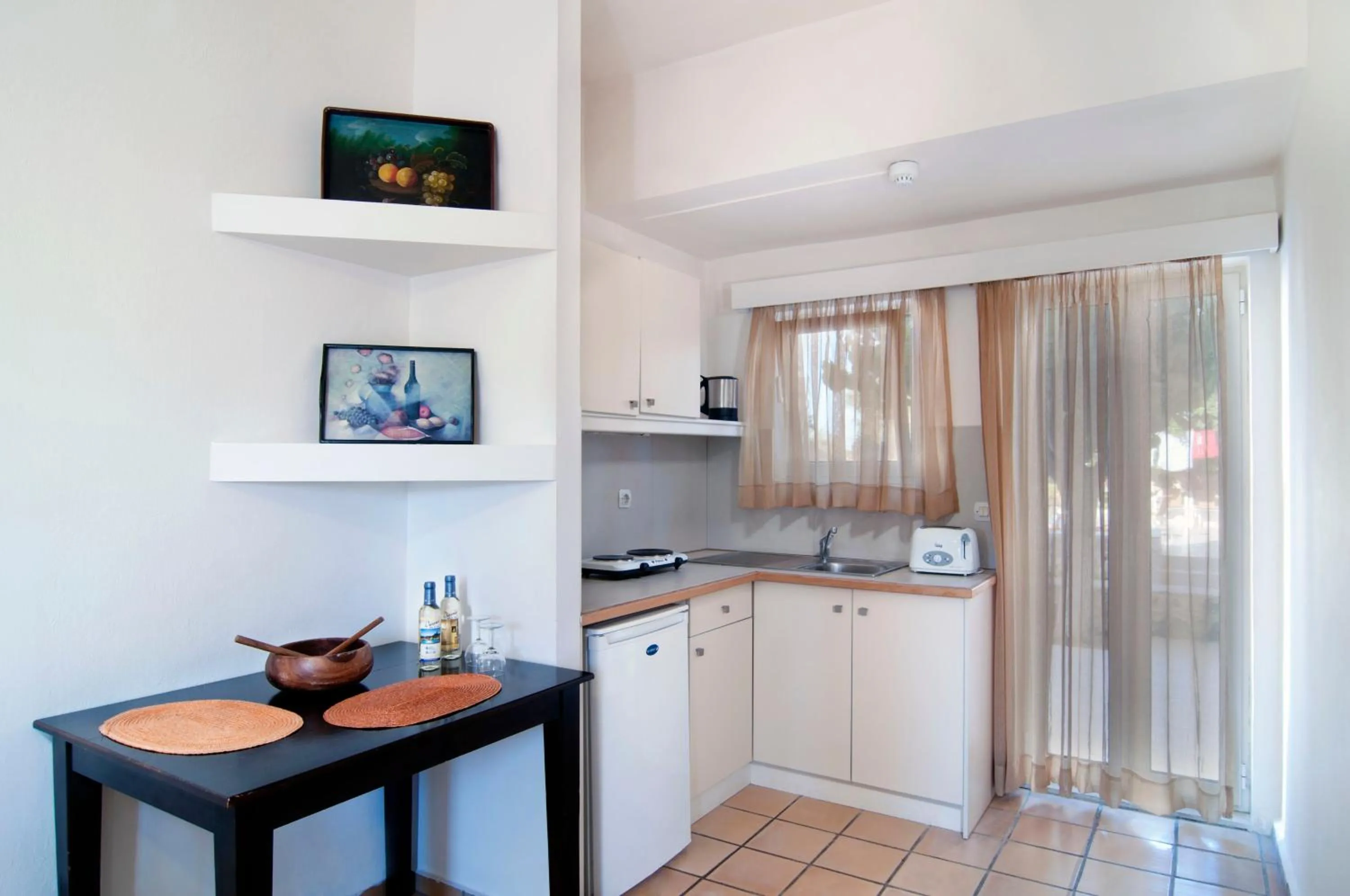 Kitchen or kitchenette in Ourania Apartments Hotel