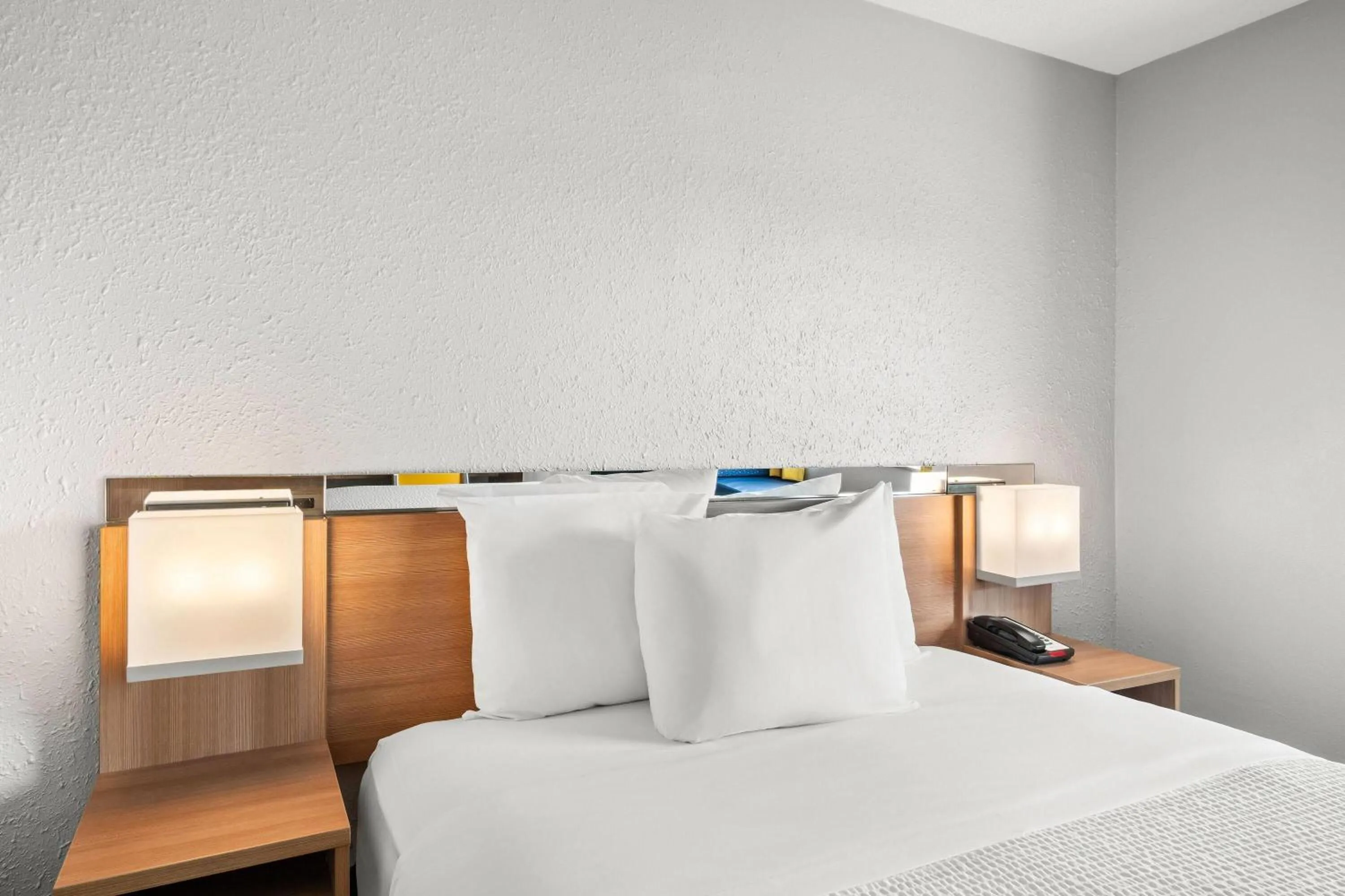 Bed in Microtel Inn by Wyndham Lexington