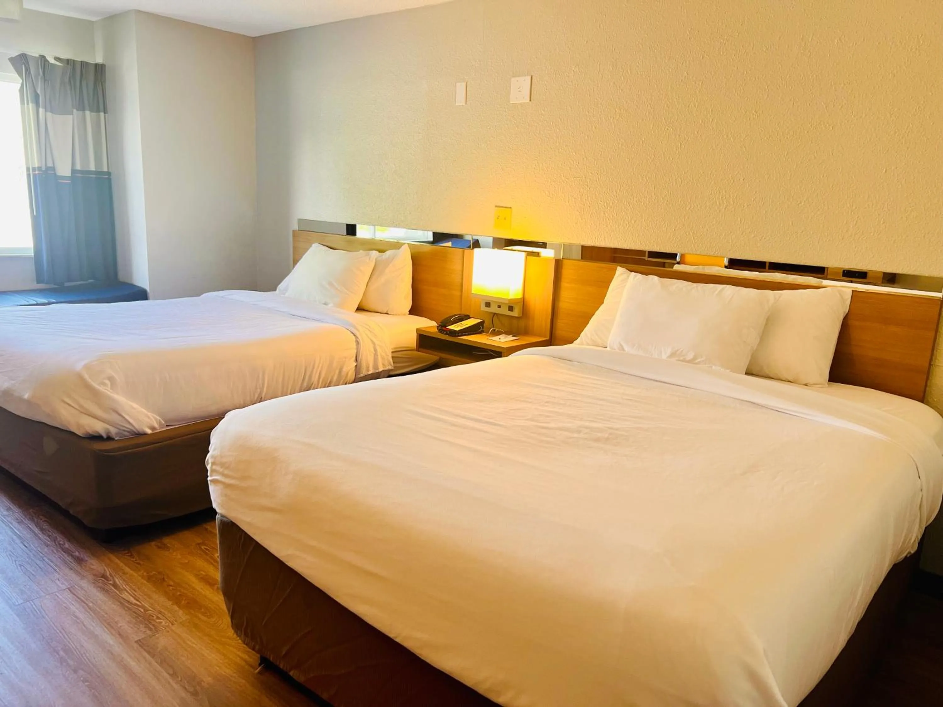 Bed in Microtel Inn by Wyndham Lexington