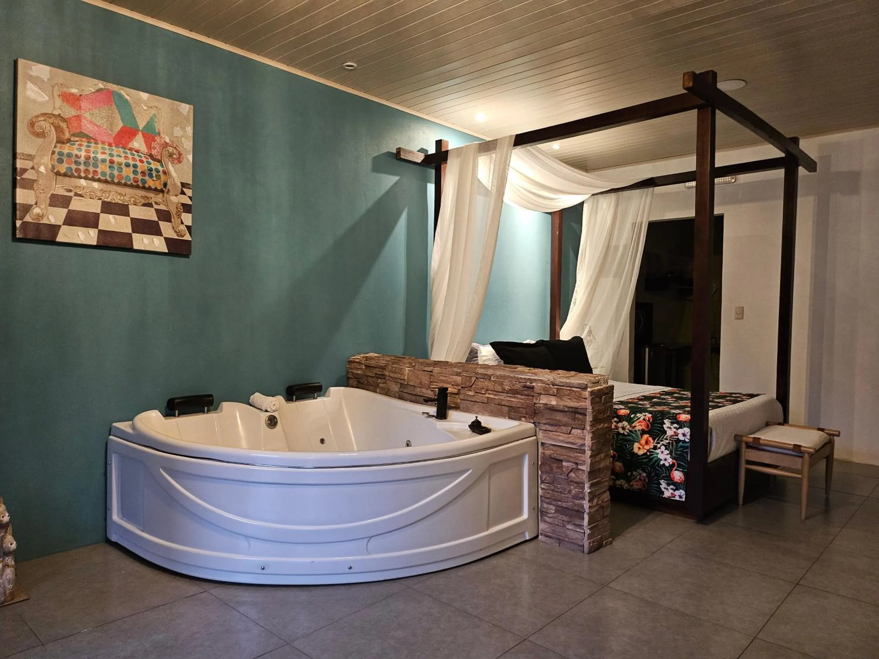 Bed in Yellow Tree Suites