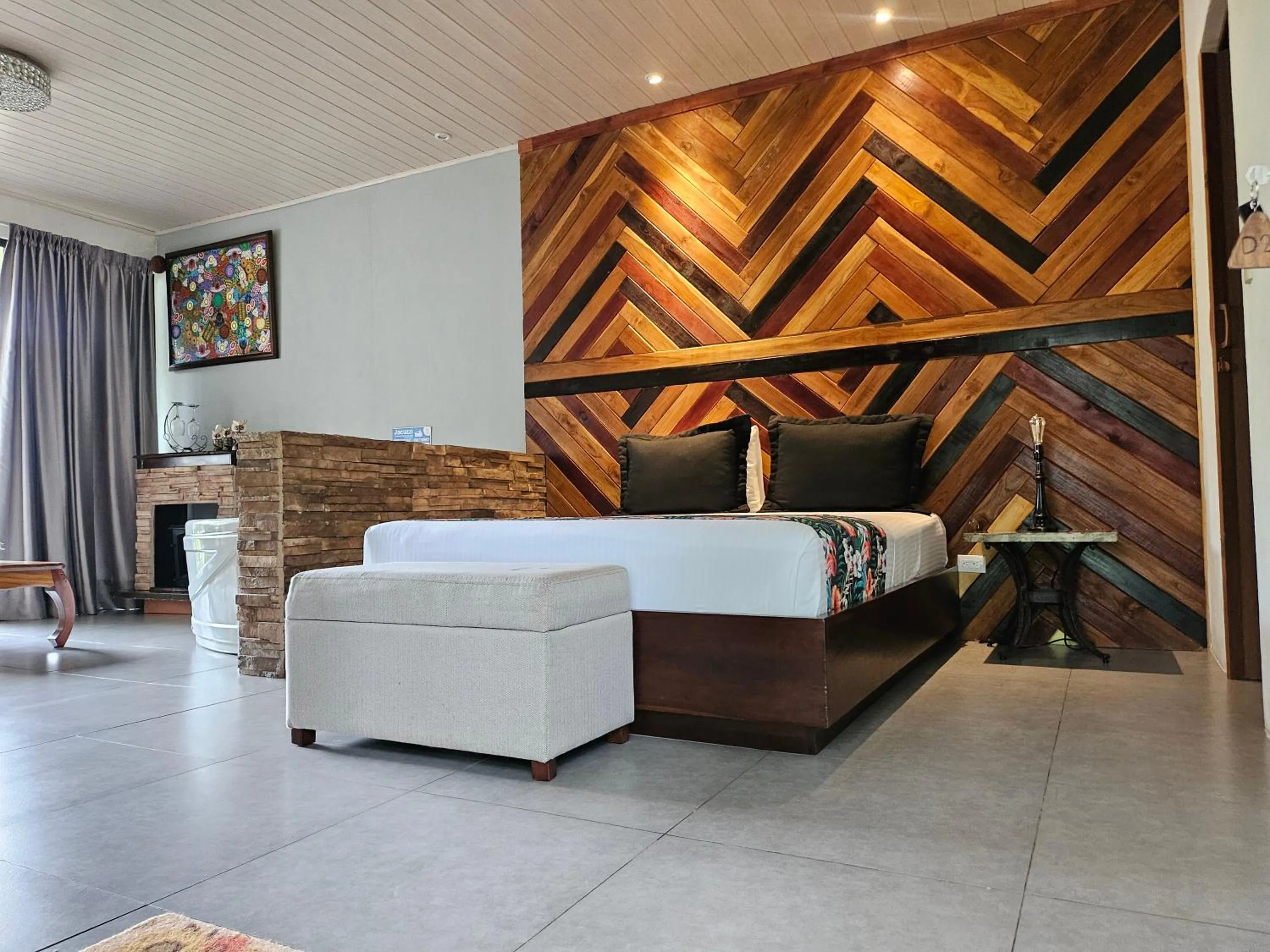 Bed in Yellow Tree Suites