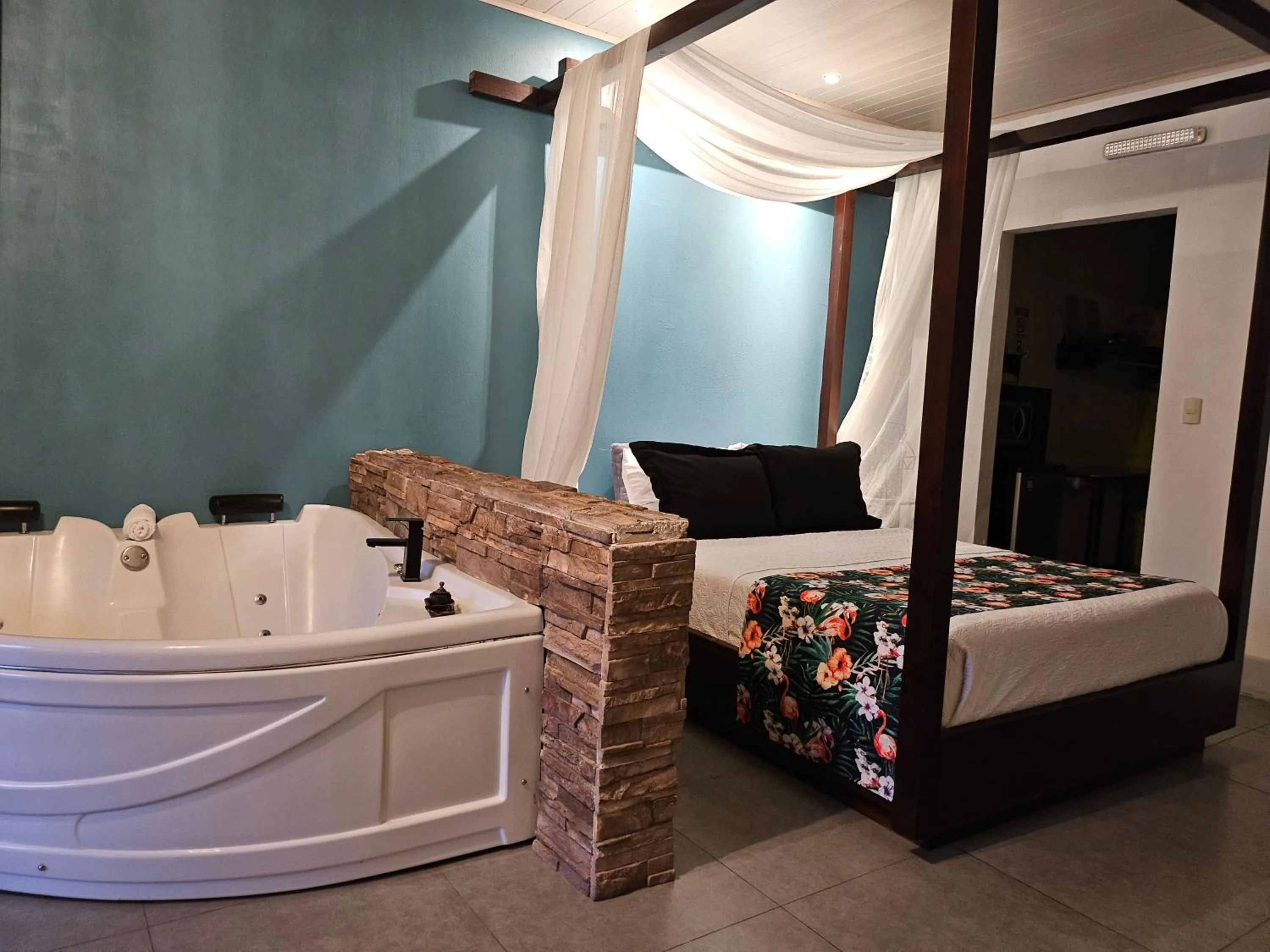 Bed in Yellow Tree Suites