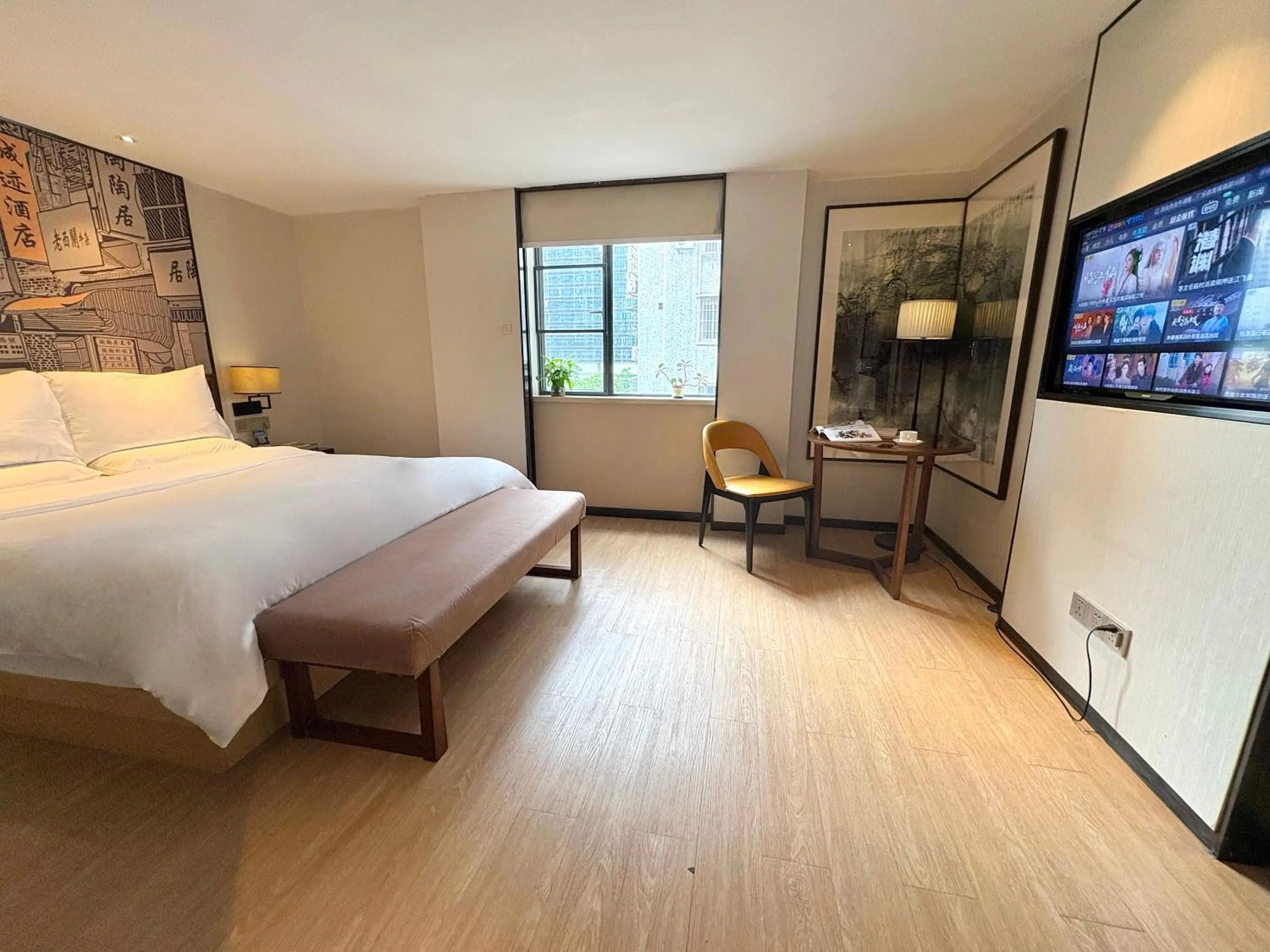Communal lounge/ TV room, Bed in Guangzhou City Join Hotel Shipai Qiao metro Branch
