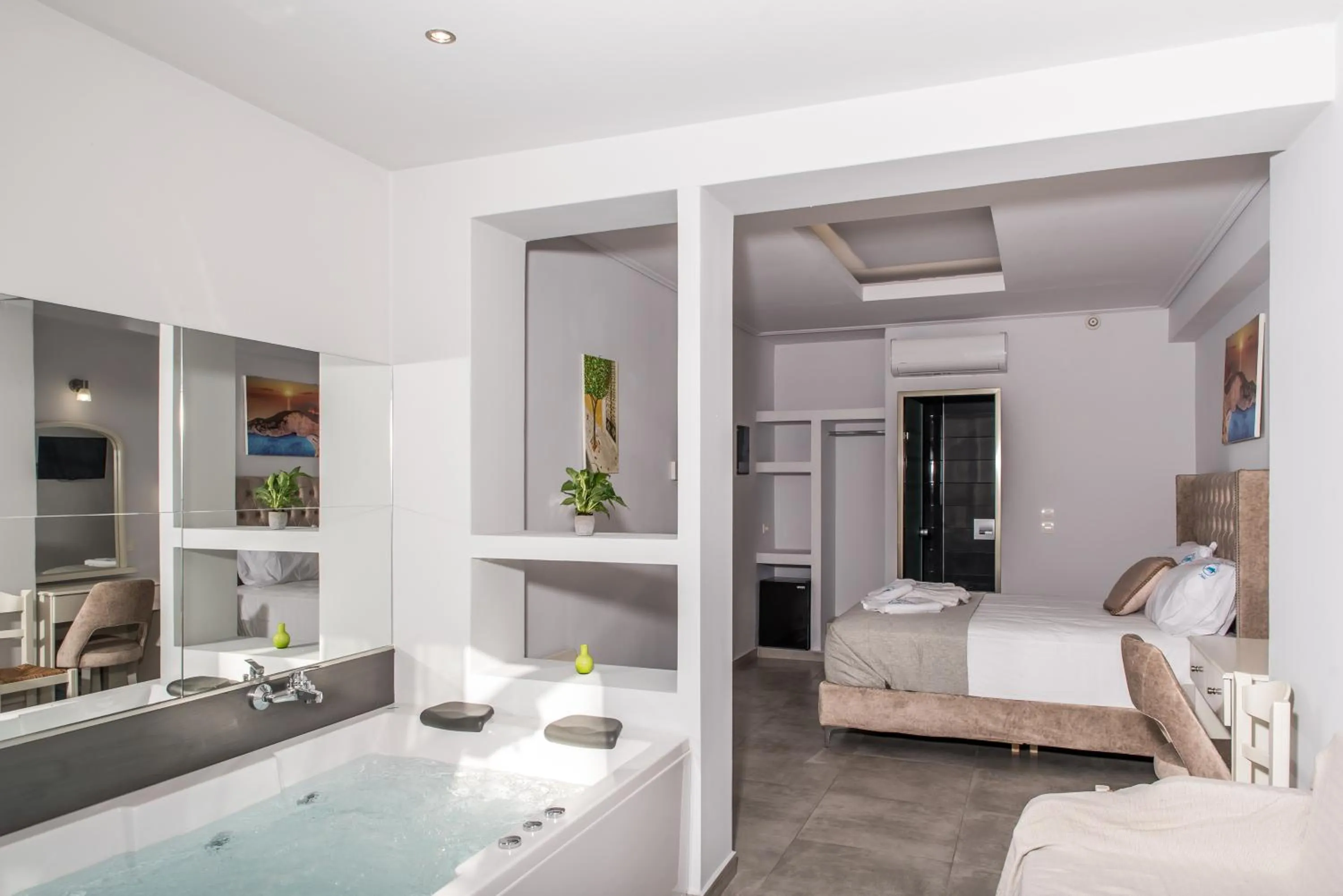 Bed in Denise Beach Hotel