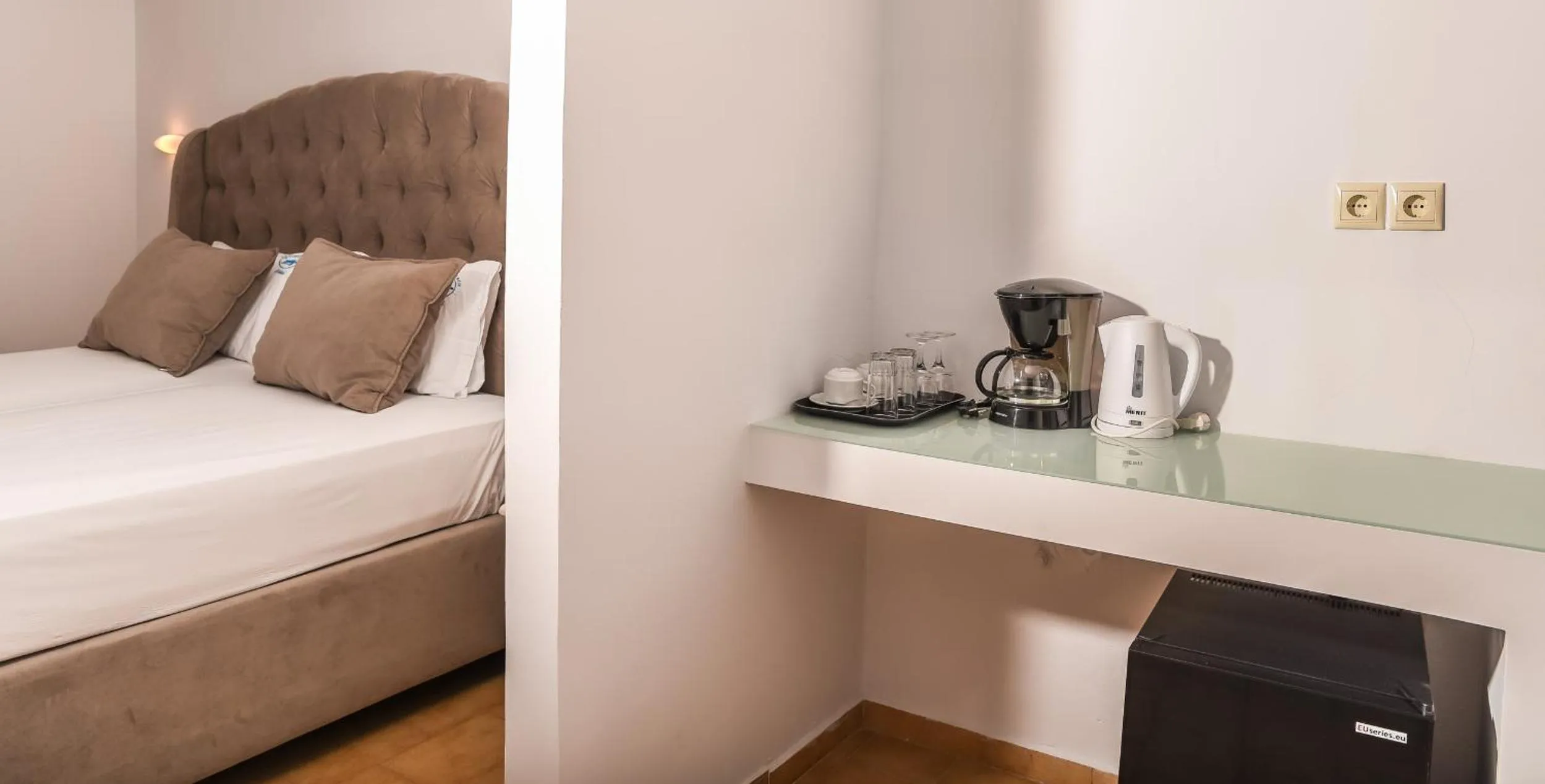 Bed in Denise Beach Hotel