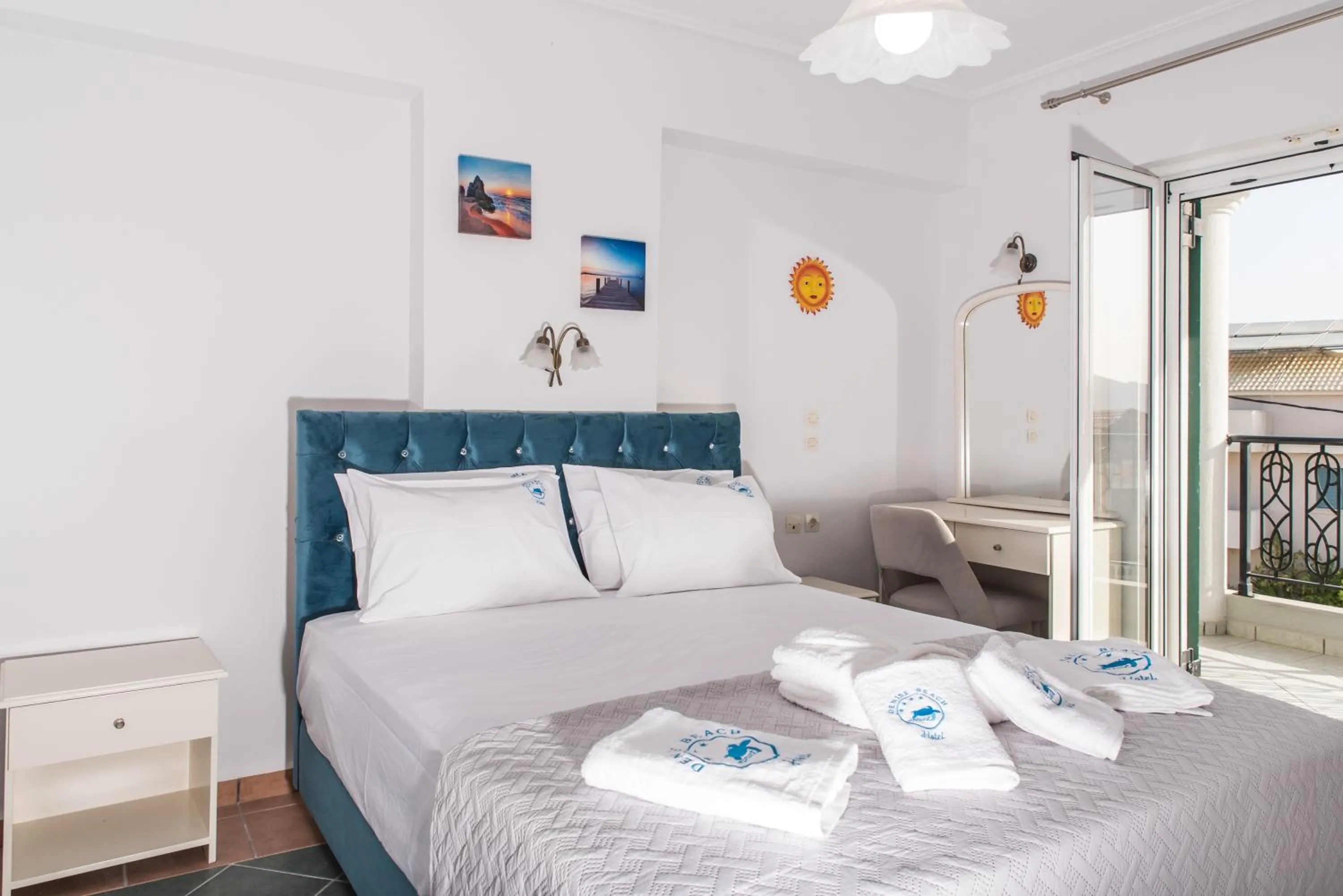 Bed in Denise Beach Hotel