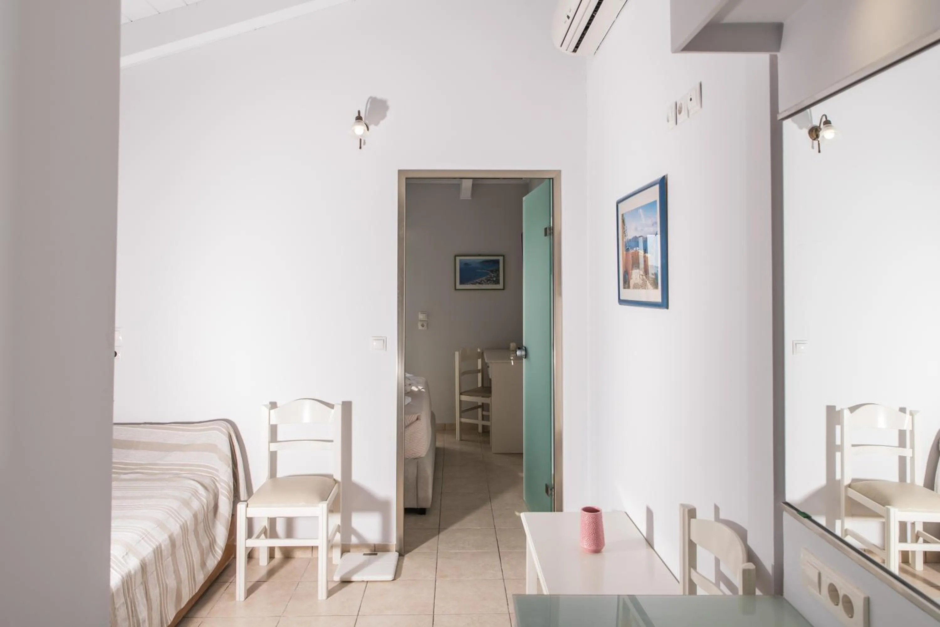 Bed in Denise Beach Hotel