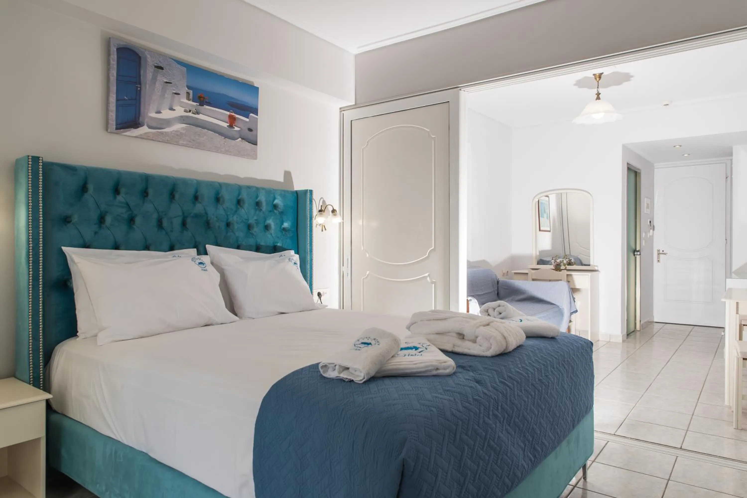 Bed in Denise Beach Hotel