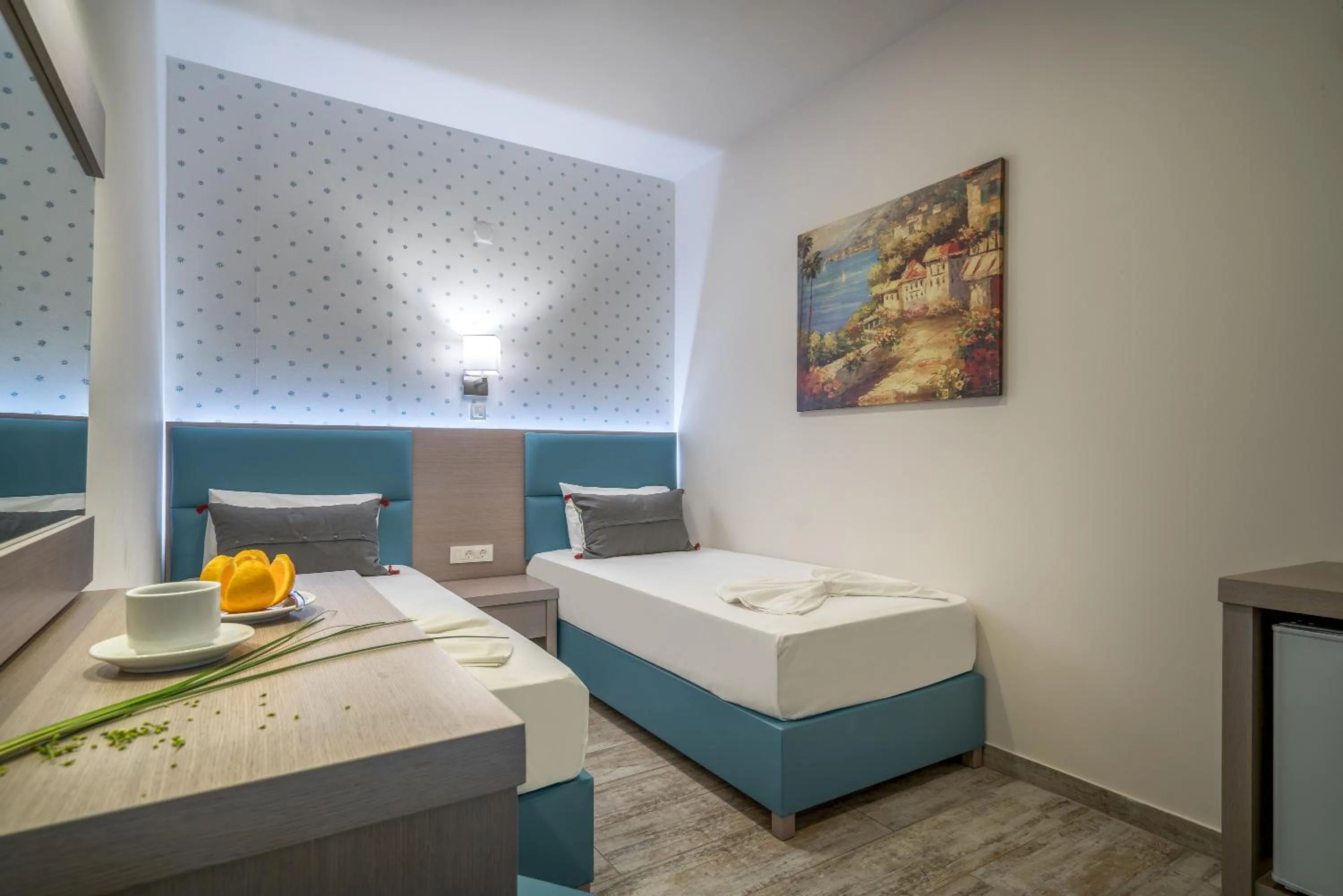 Bed in Denise Beach Hotel