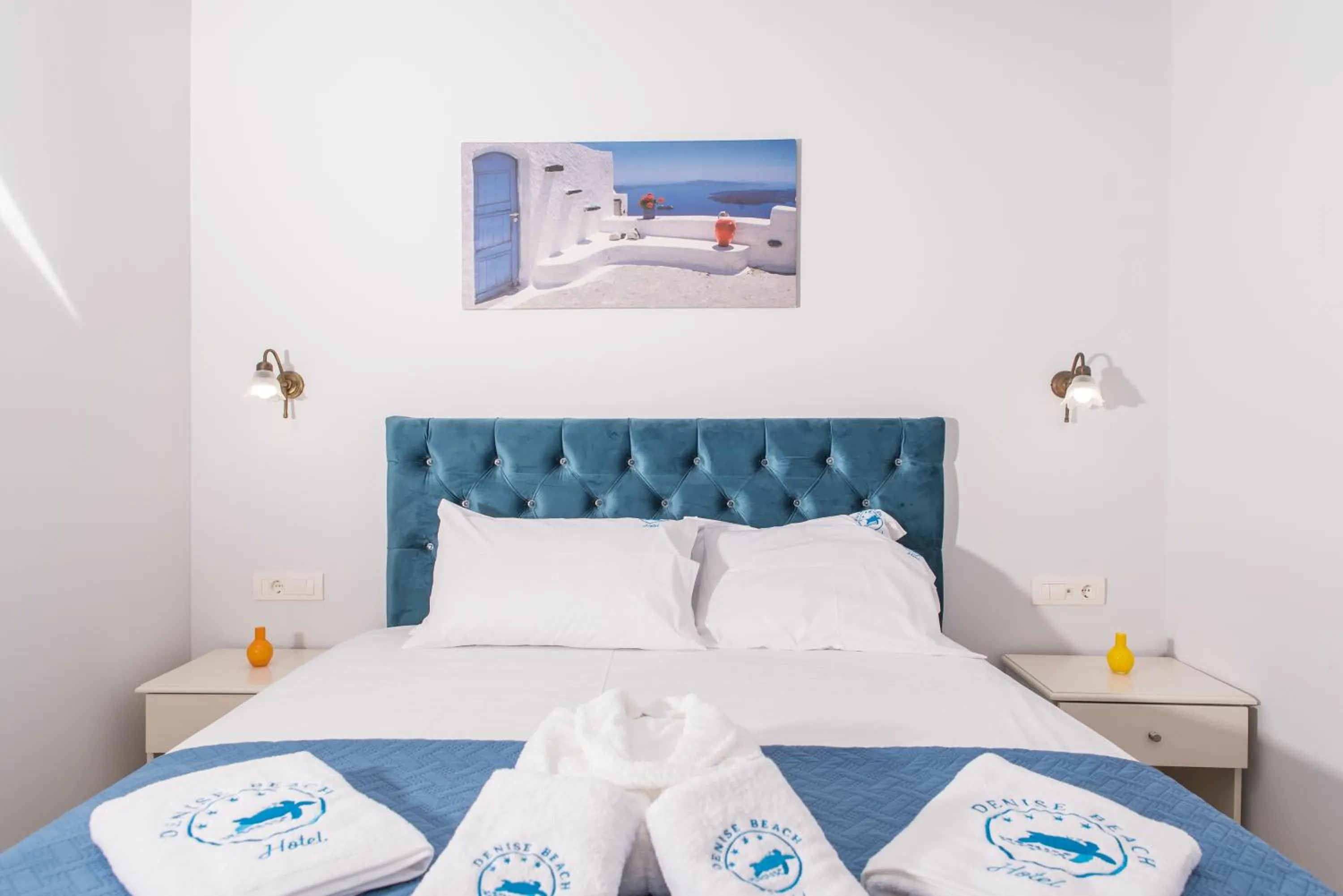 Bed in Denise Beach Hotel