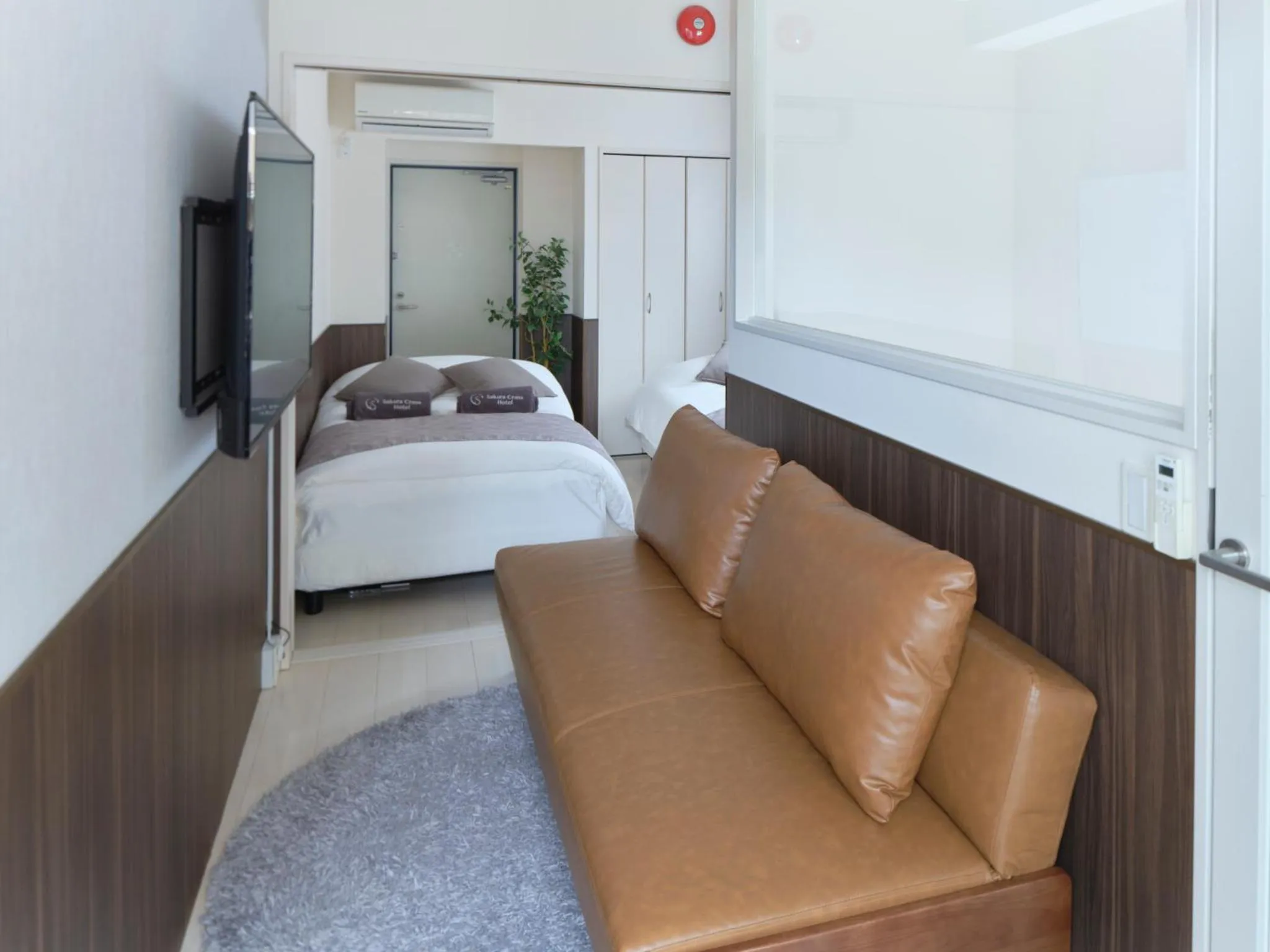 Photo of the whole room, Bed in Sakura Cross Hotel Ueno Iriya