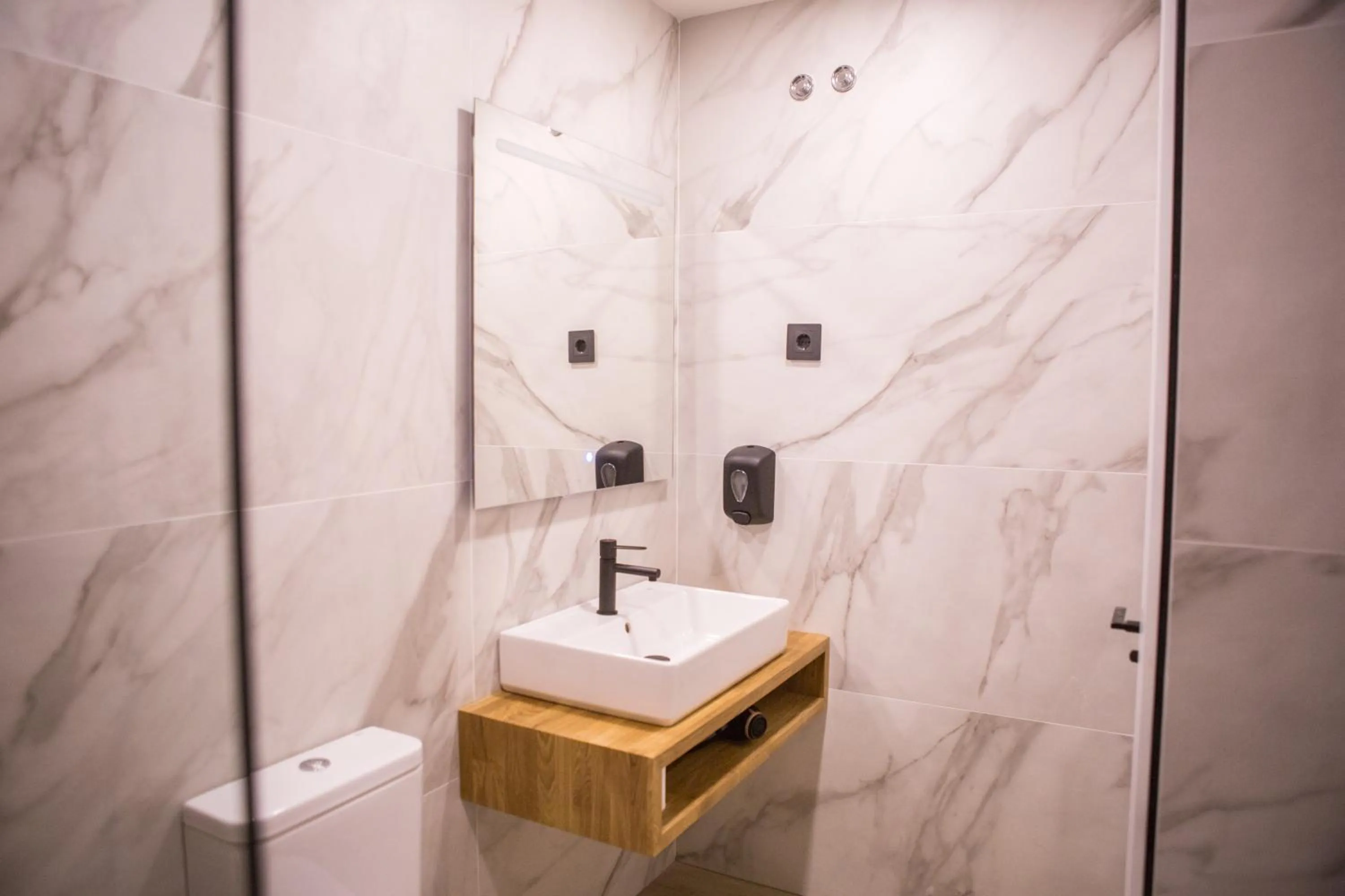 Bathroom in Apartamentos Málaga Premium - Calle San Telmo