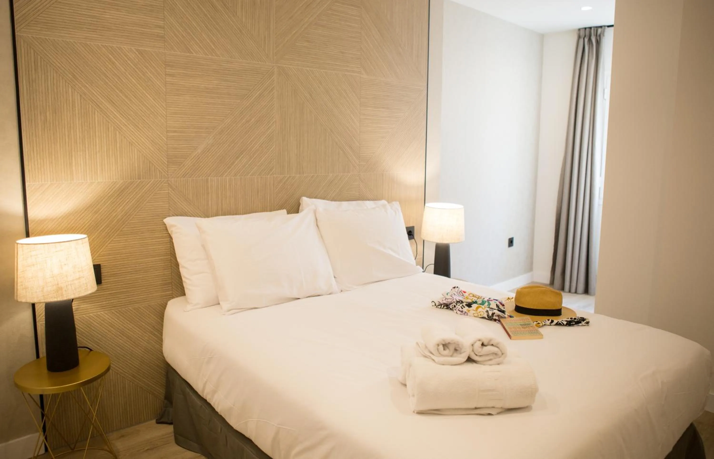 Bedroom, Bed in Apartamentos Málaga Premium - Calle San Telmo