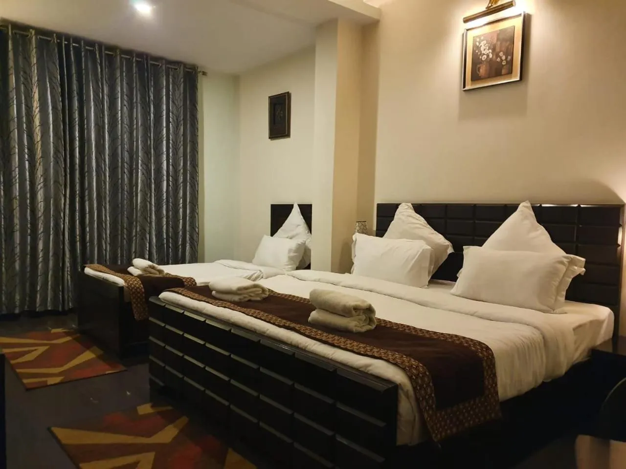 Bed in Hotel Corbett Kingdom