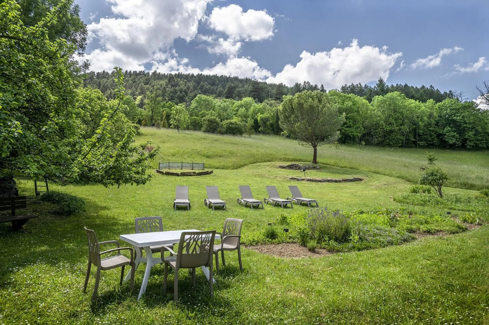 Garden in Logis Hôtel Restaurant Le Mont Aigoual
