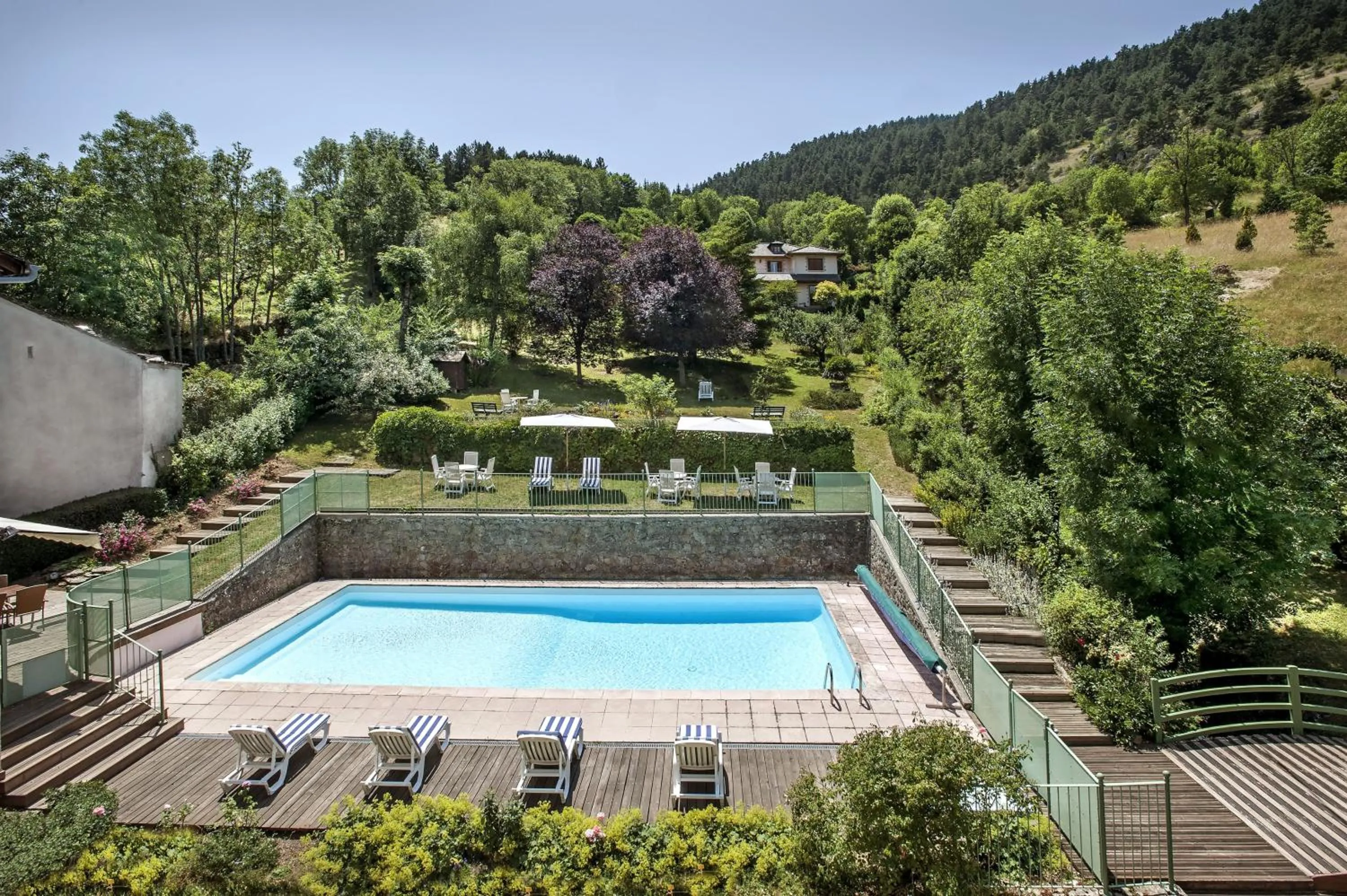 Garden in Logis Hôtel Restaurant Le Mont Aigoual