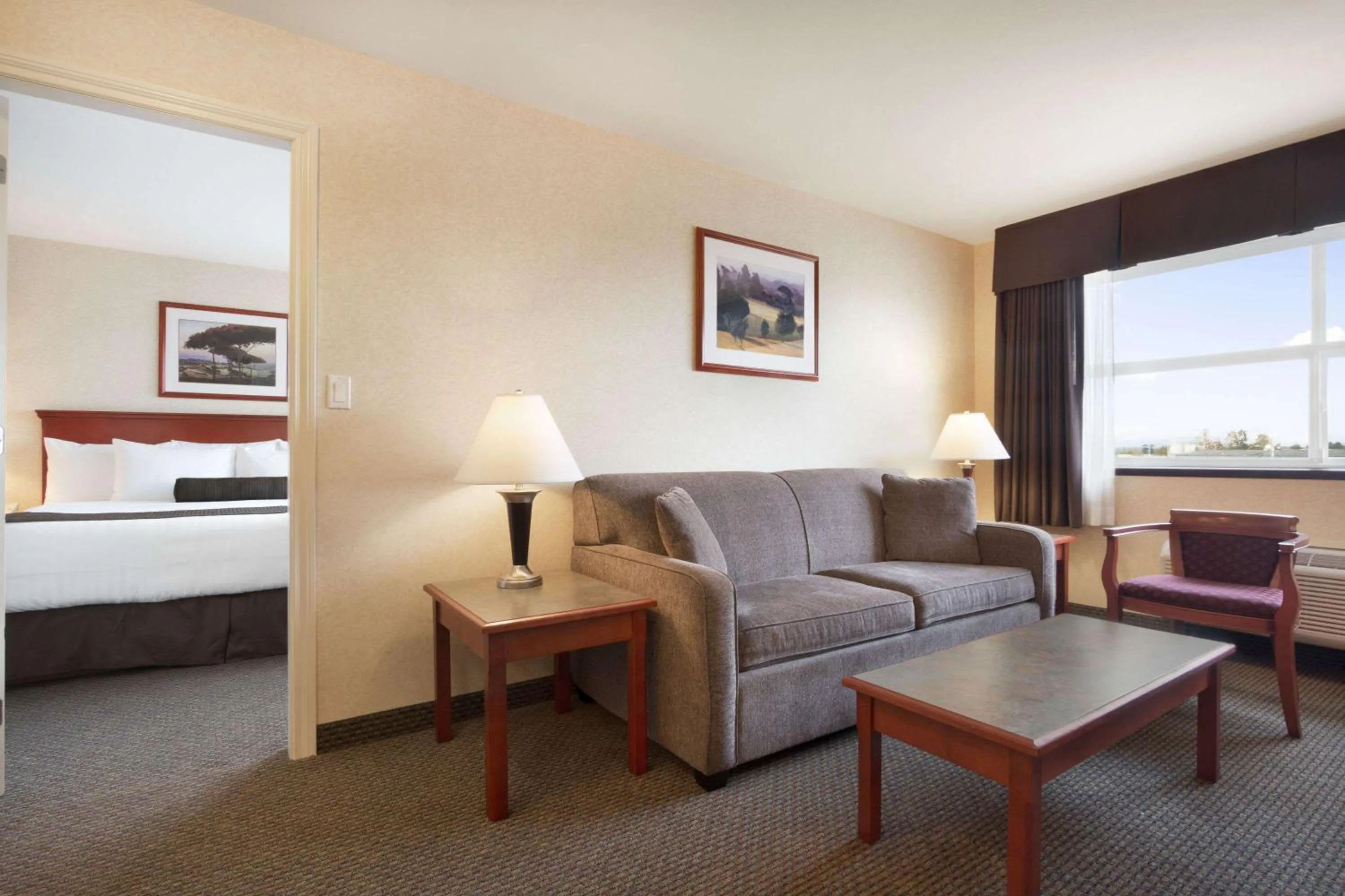 Photo of the whole room, Bed in Days Inn & Suites by Wyndham Langley