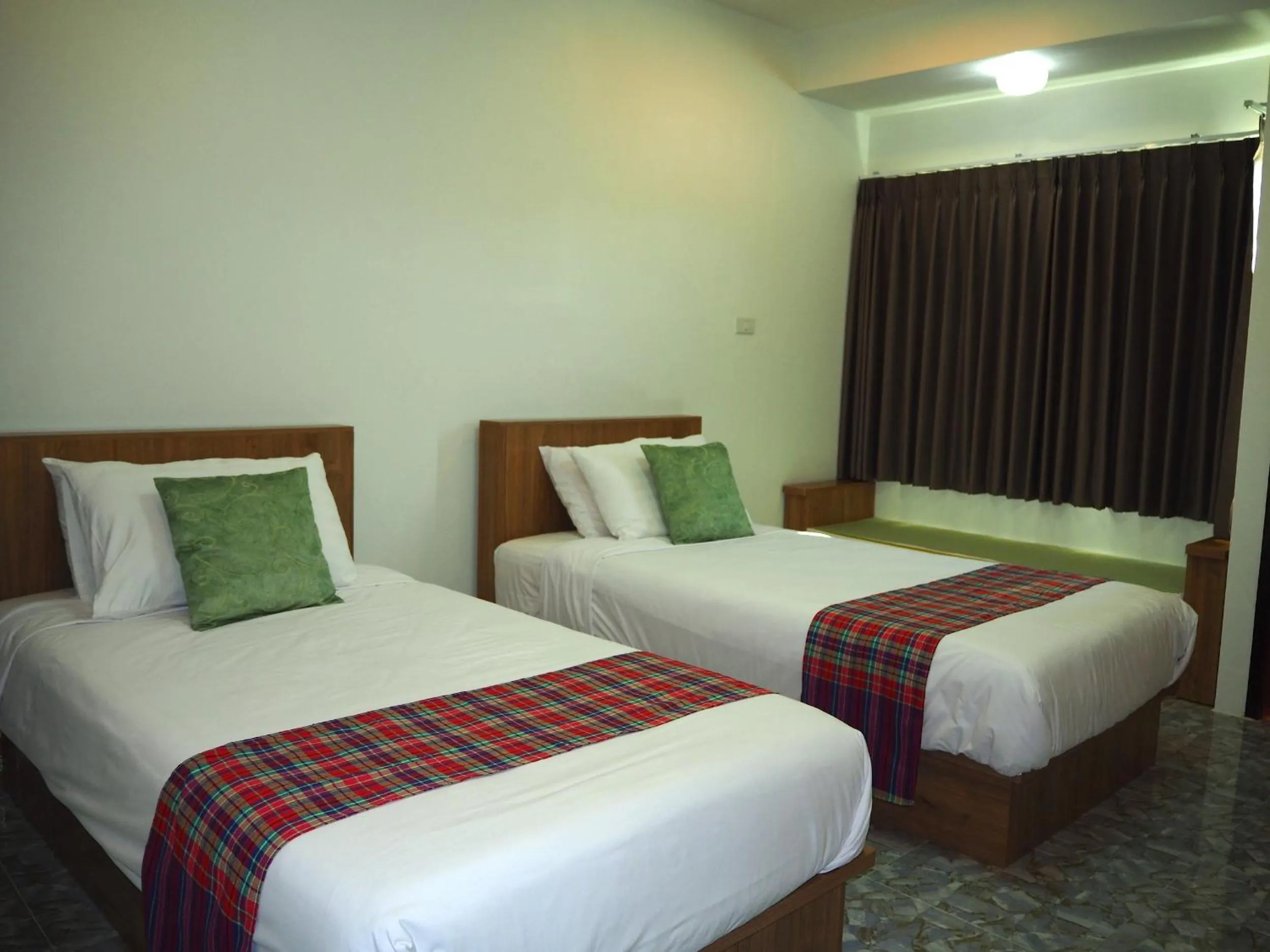 Bed in Ina Boutique Home Nan