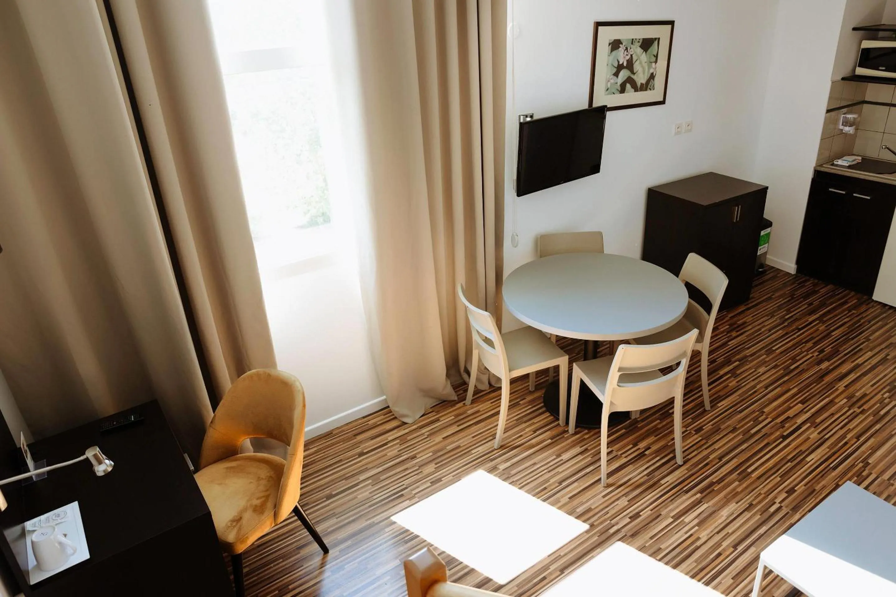 Bedroom in Clarion Aparthotel Toulouse Le Parc de l'Escale