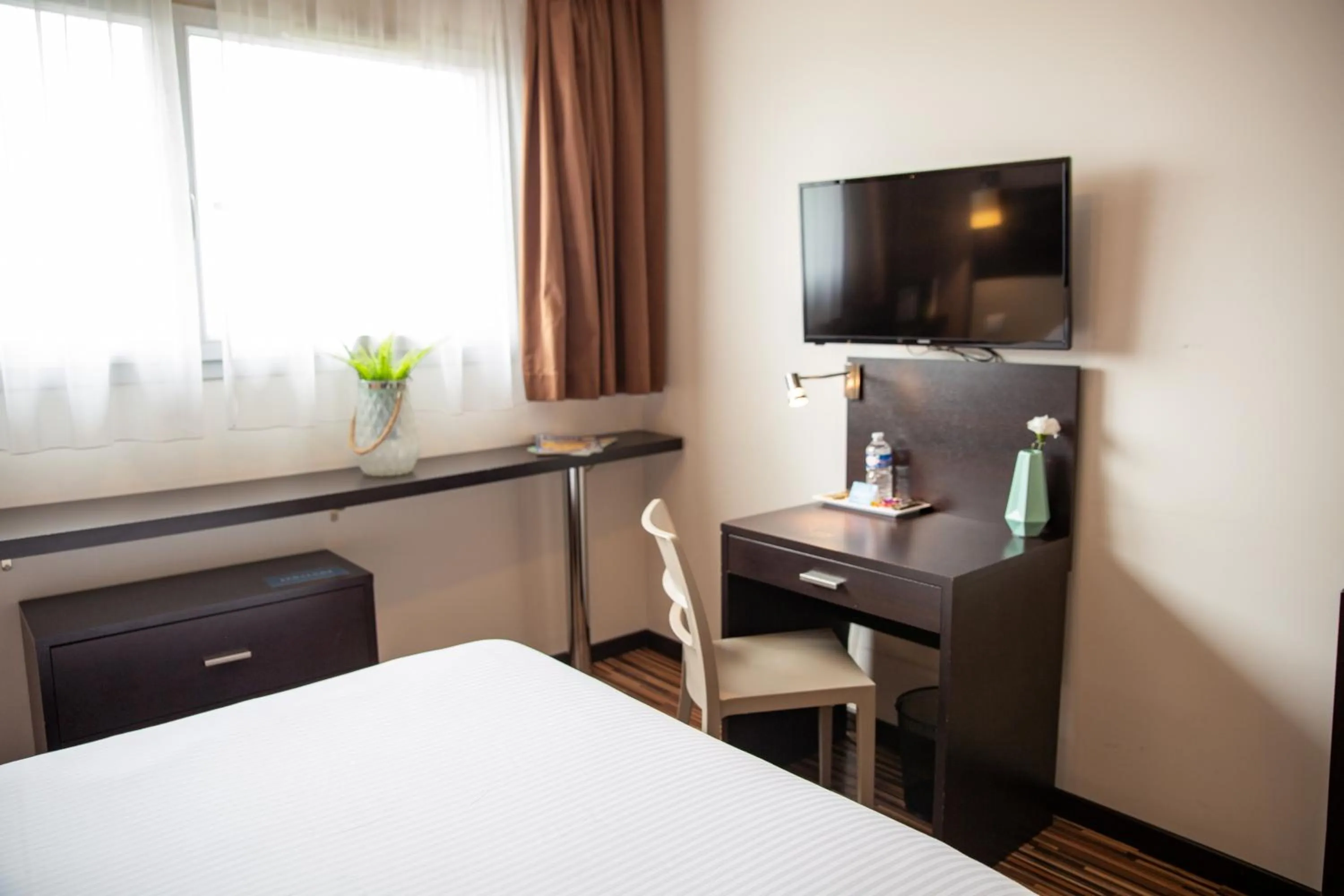 Photo of the whole room, Bed in Clarion Aparthotel Toulouse Le Parc de l'Escale