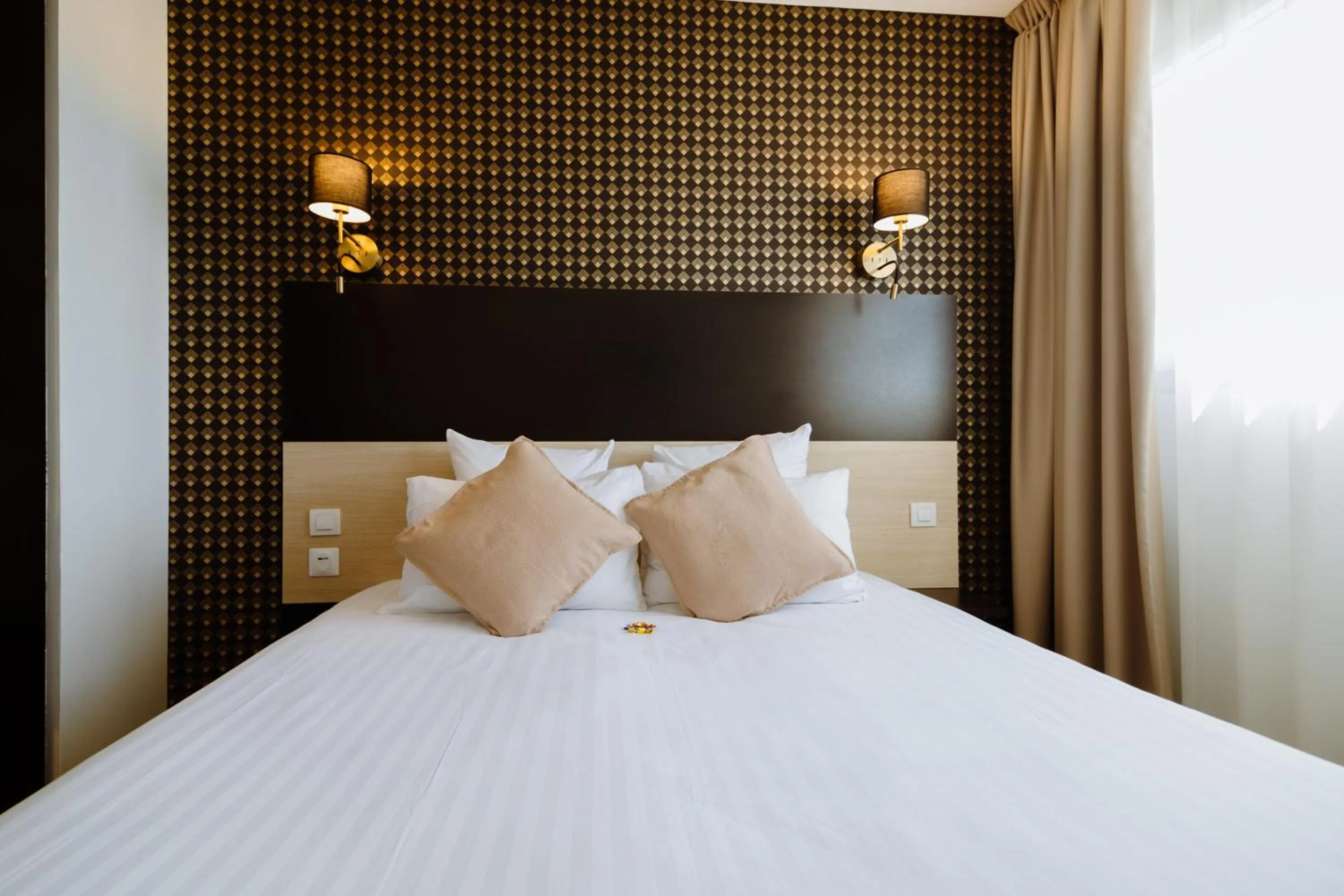 Bed in Clarion Aparthotel Toulouse Le Parc de l'Escale