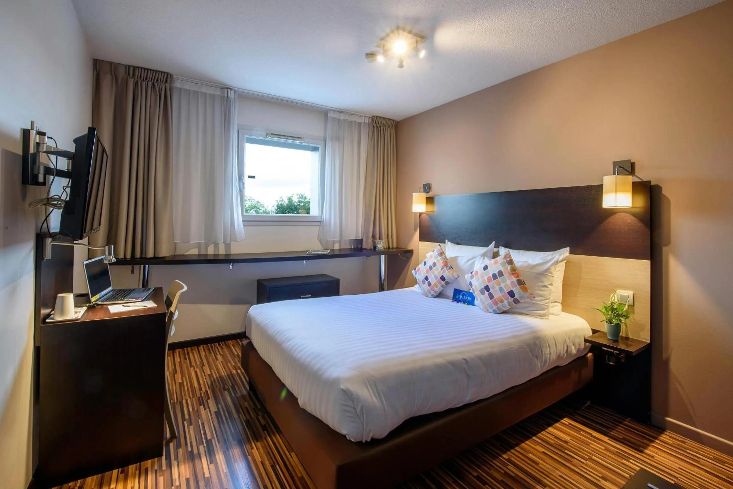 Bedroom, Bed in Clarion Aparthotel Toulouse Le Parc de l'Escale