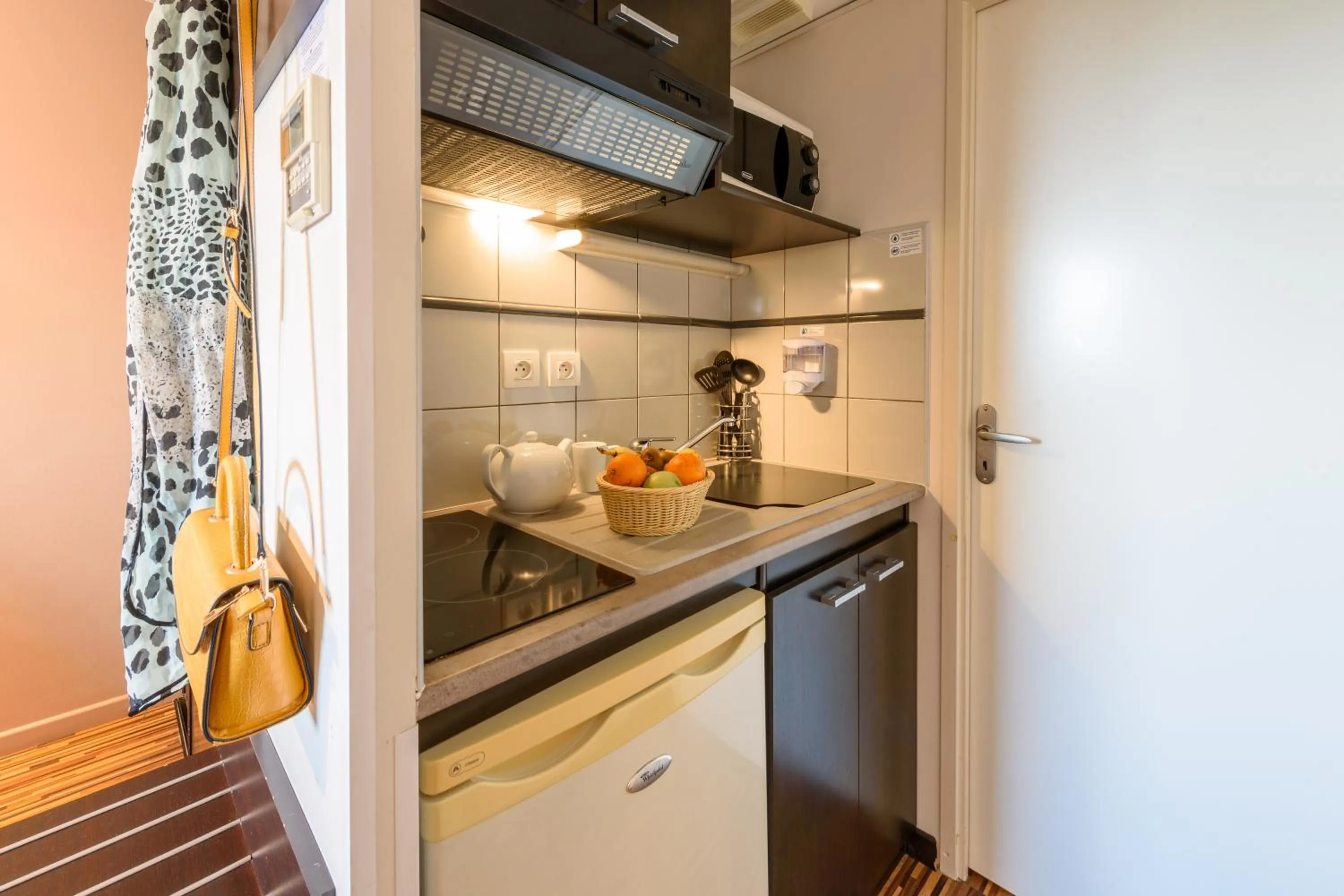 Kitchen or kitchenette in Clarion Aparthotel Toulouse Le Parc de l'Escale