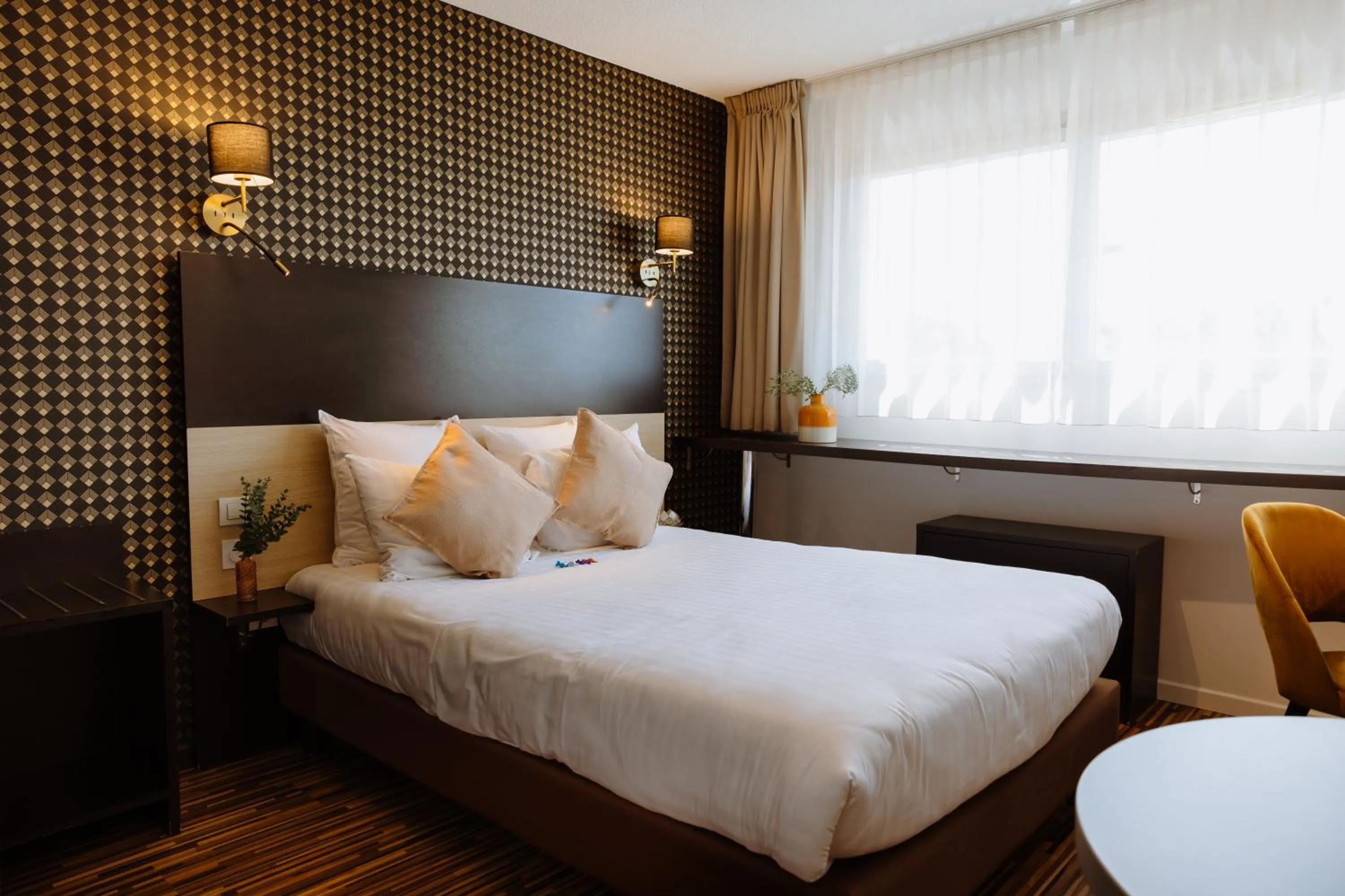 Bed in Clarion Aparthotel Toulouse Le Parc de l'Escale