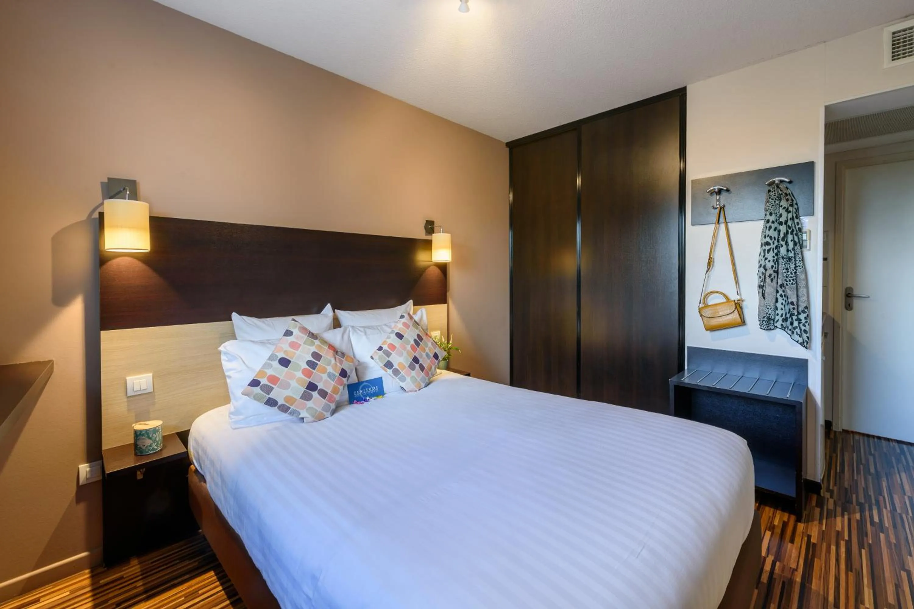 Bed in Clarion Aparthotel Toulouse Le Parc de l'Escale