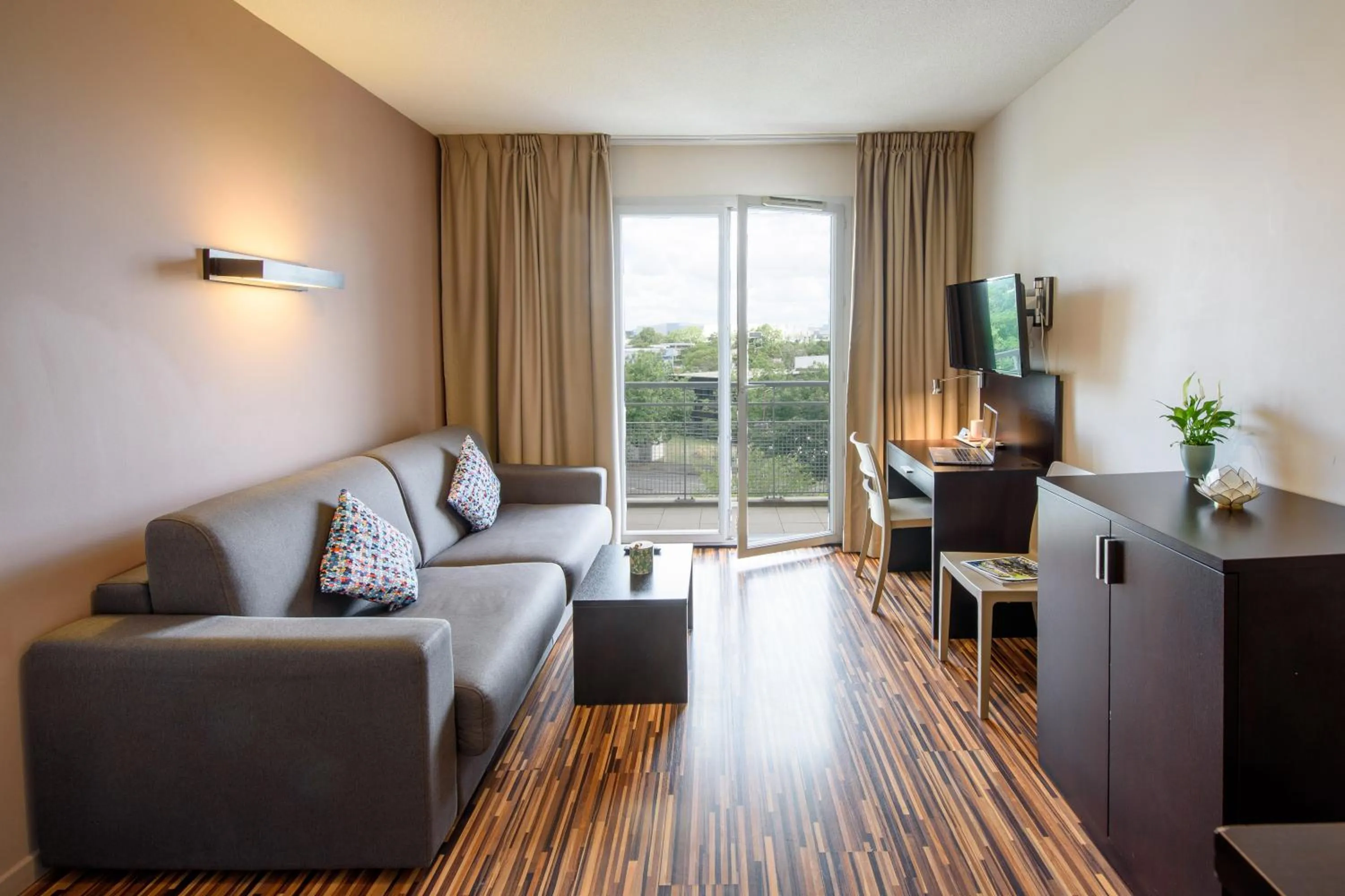 Photo of the whole room in Clarion Aparthotel Toulouse Le Parc de l'Escale