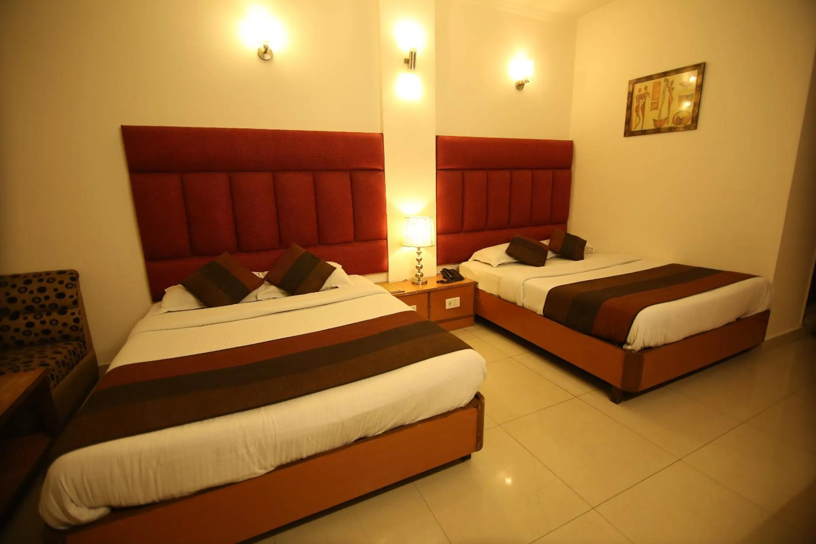 Bed in Hotel Parkway Deluxe