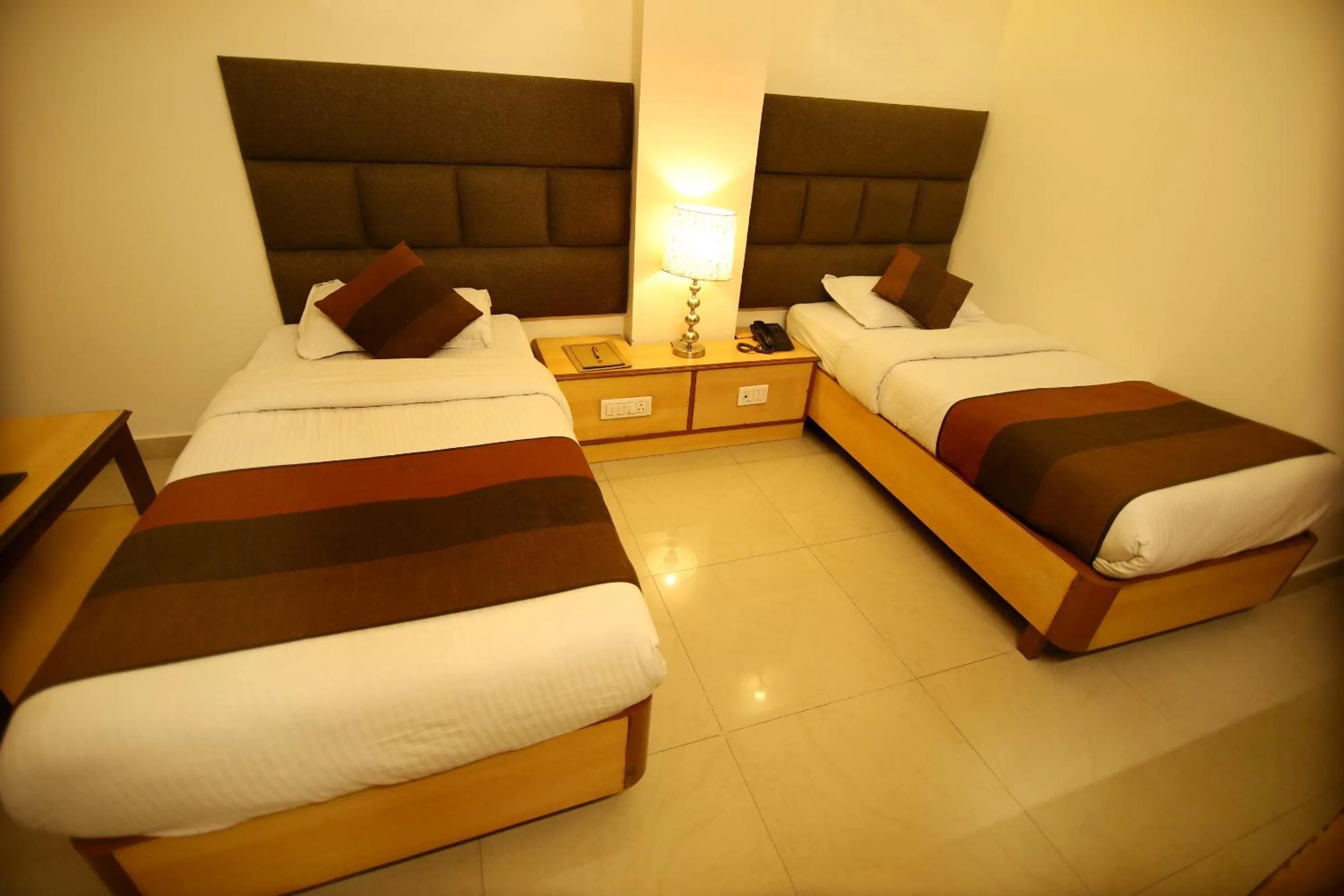 Bed in Hotel Parkway Deluxe