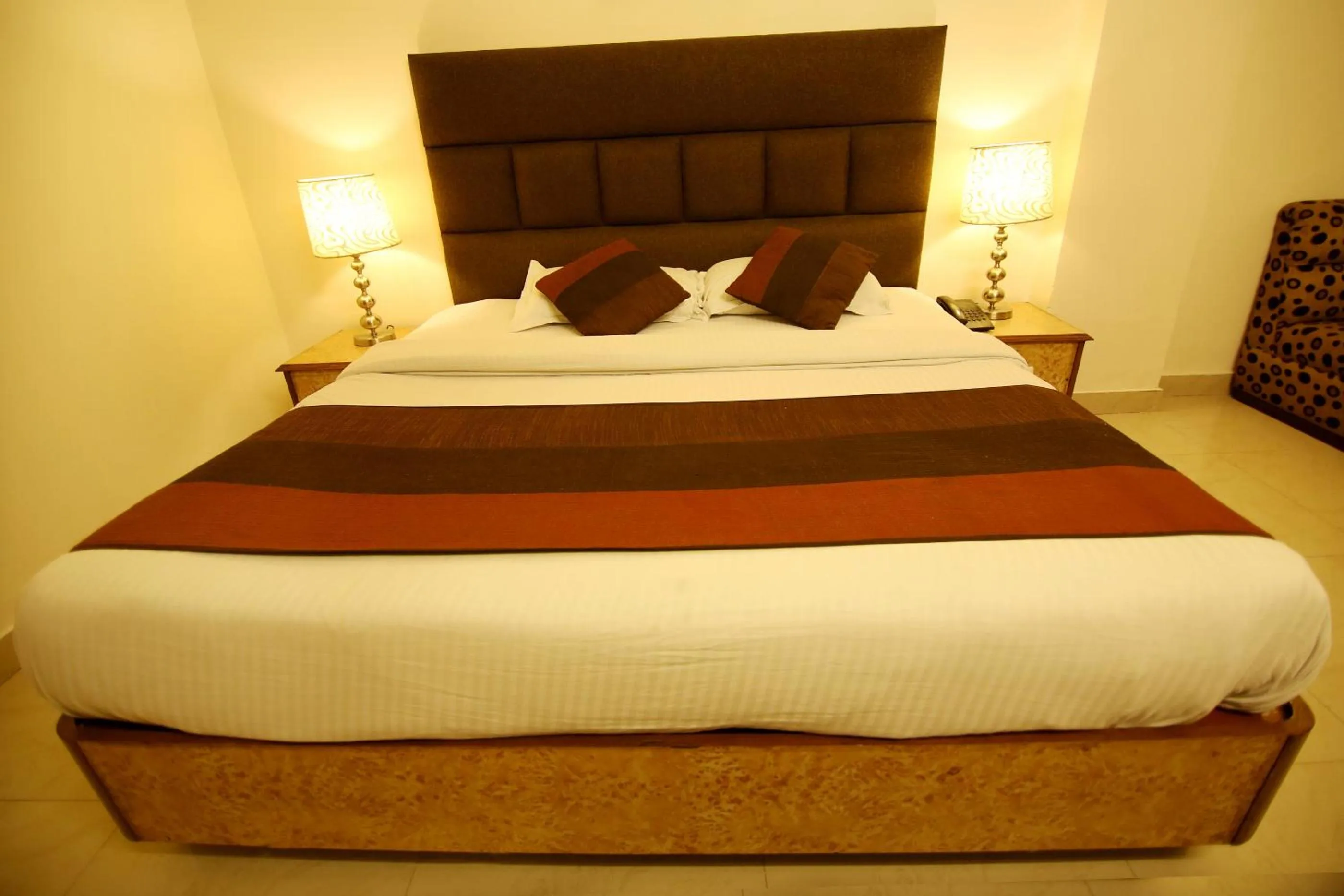 Bed in Hotel Parkway Deluxe