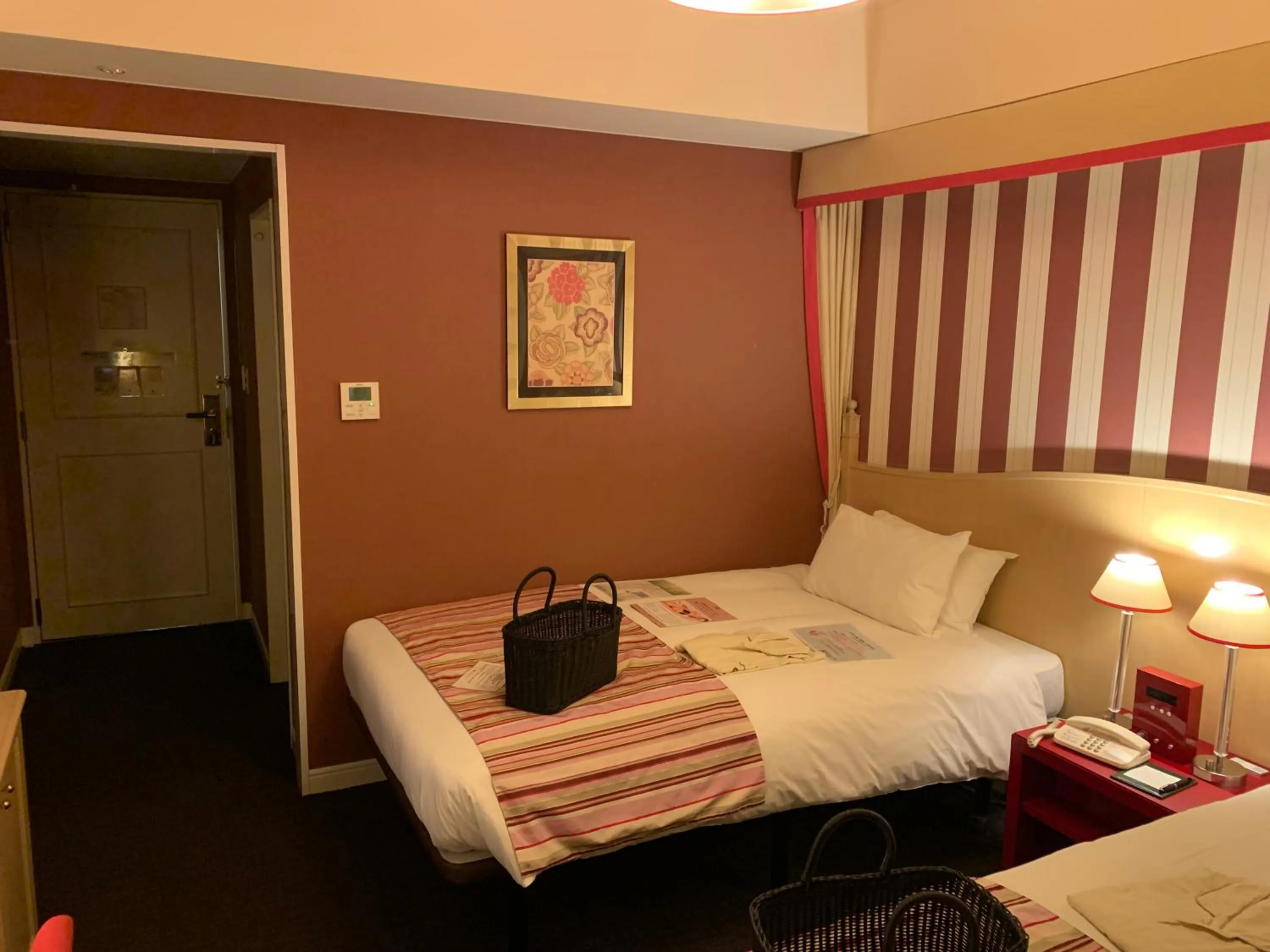 Bed in Hotel Monterey Kyoto