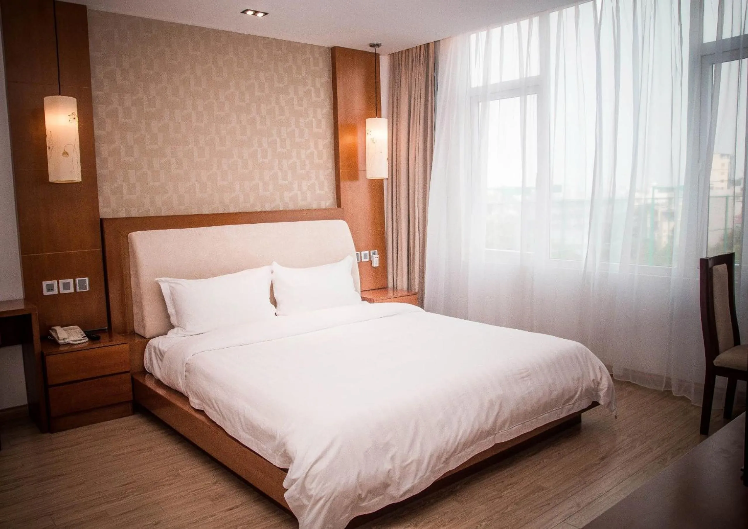 Bed in The Hanoi Club Hotel & Residences