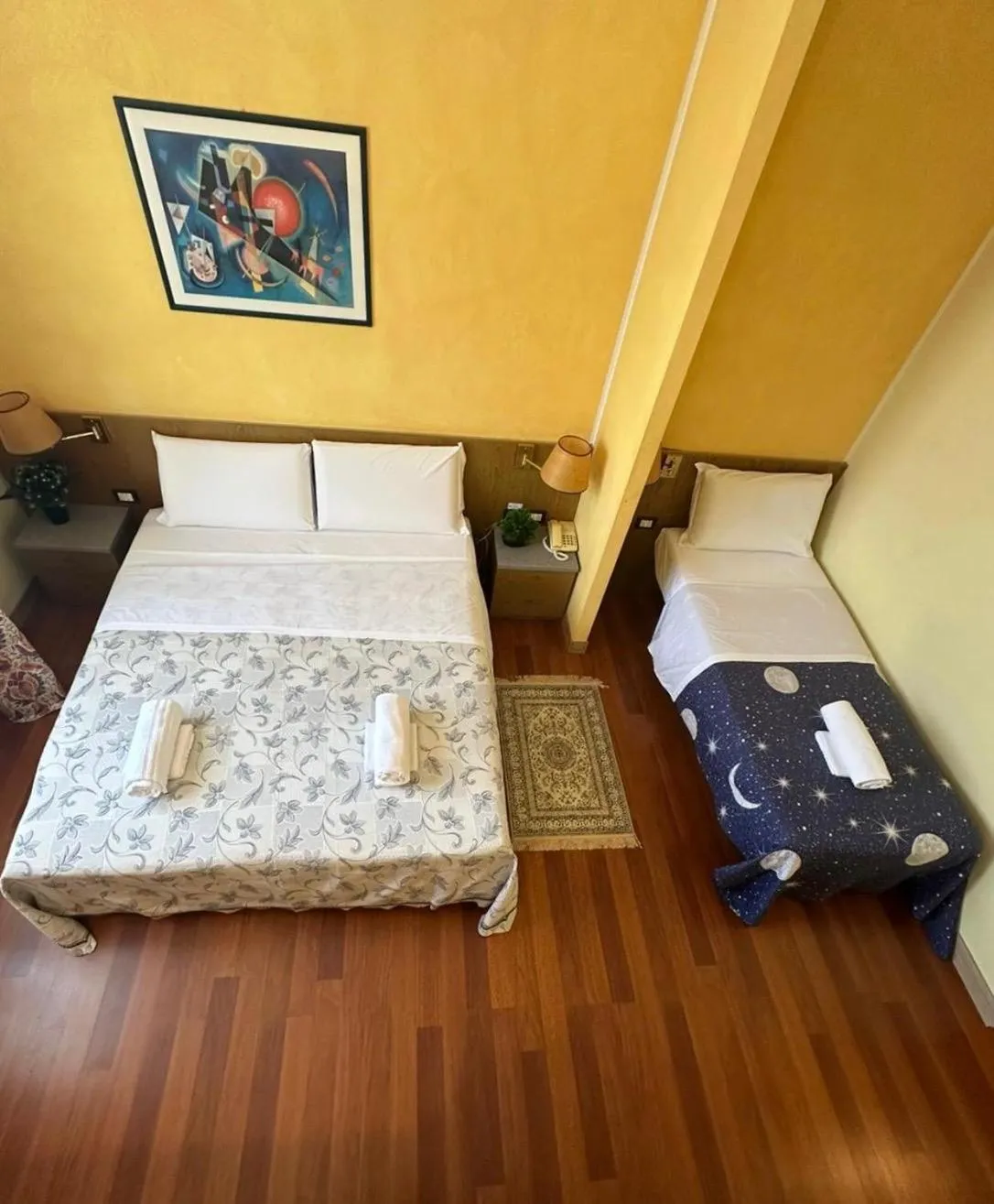 Bed in Hotel Raffaello Venice