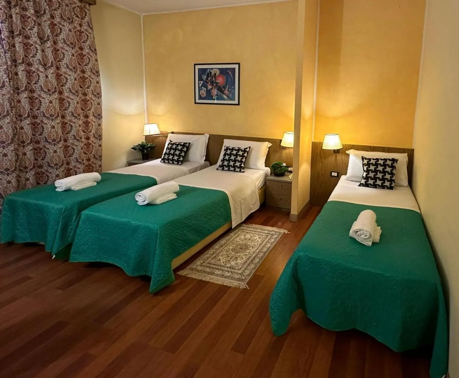 Bed in Hotel Raffaello Venice