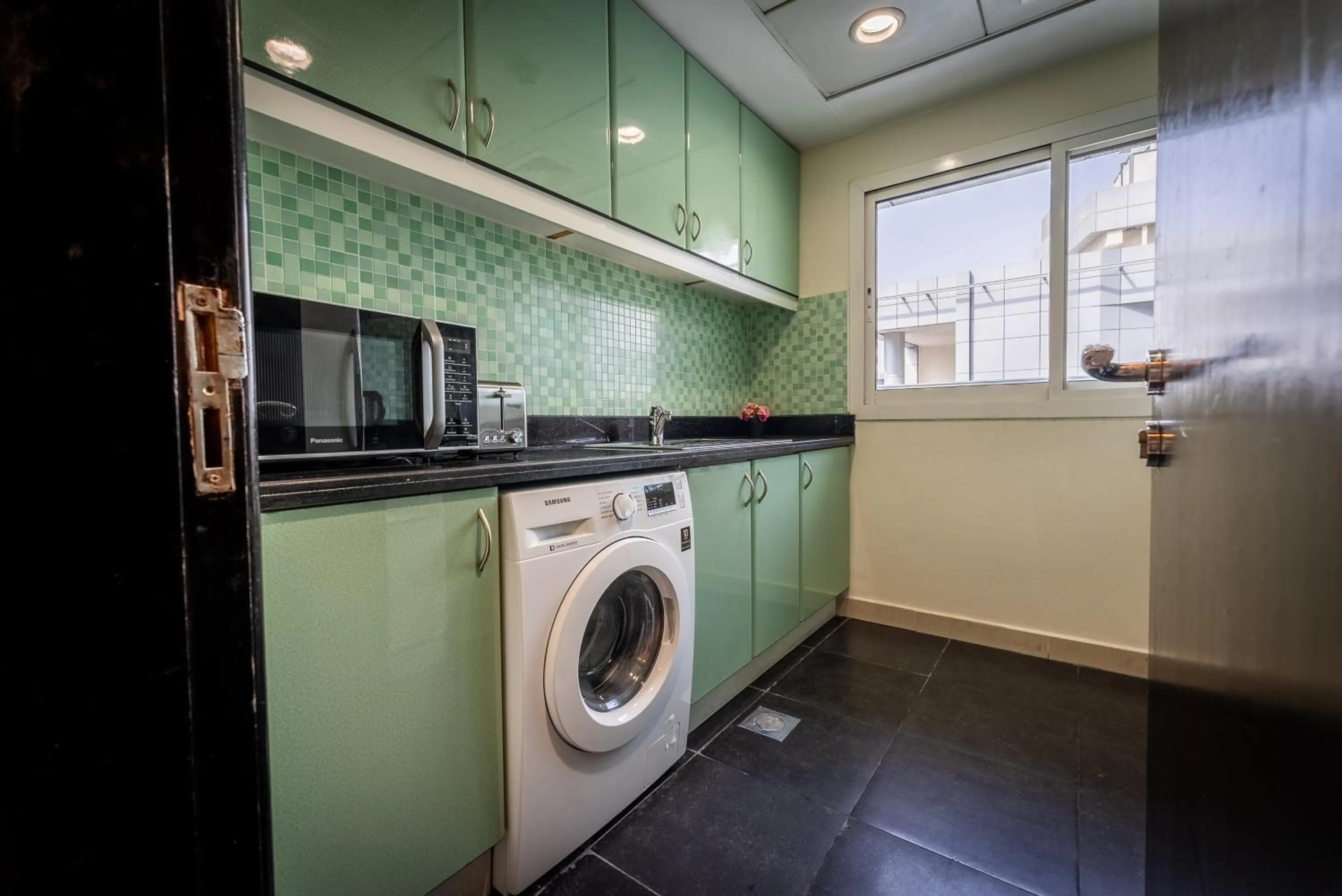 Kitchen or kitchenette in Gulf Oasis Hotel Apartments Fz LLC