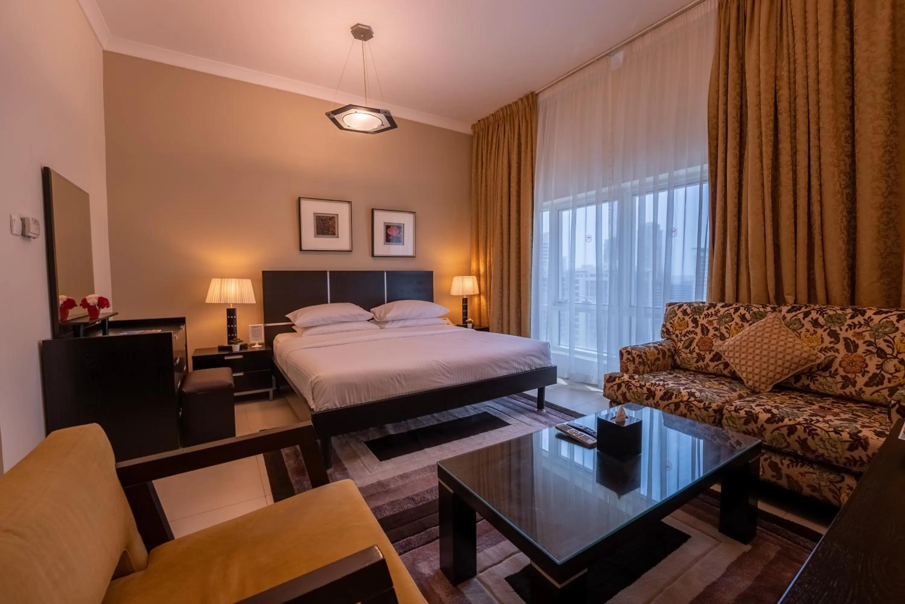 Bed in Gulf Oasis Hotel Apartments Fz LLC