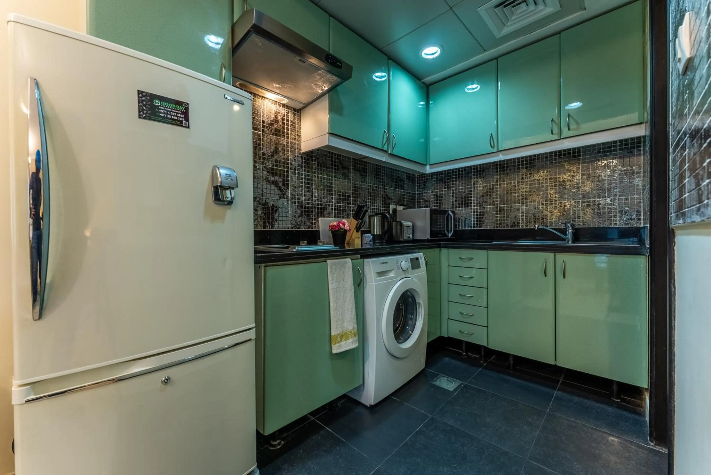 Kitchen or kitchenette in Gulf Oasis Hotel Apartments Fz LLC