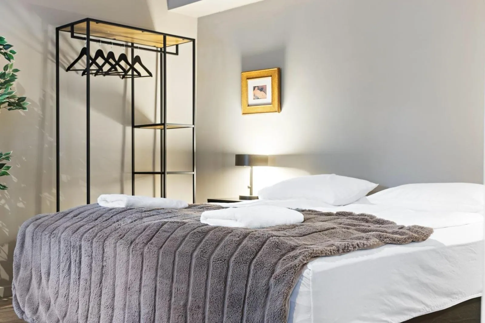 Bed in Astro Apartments