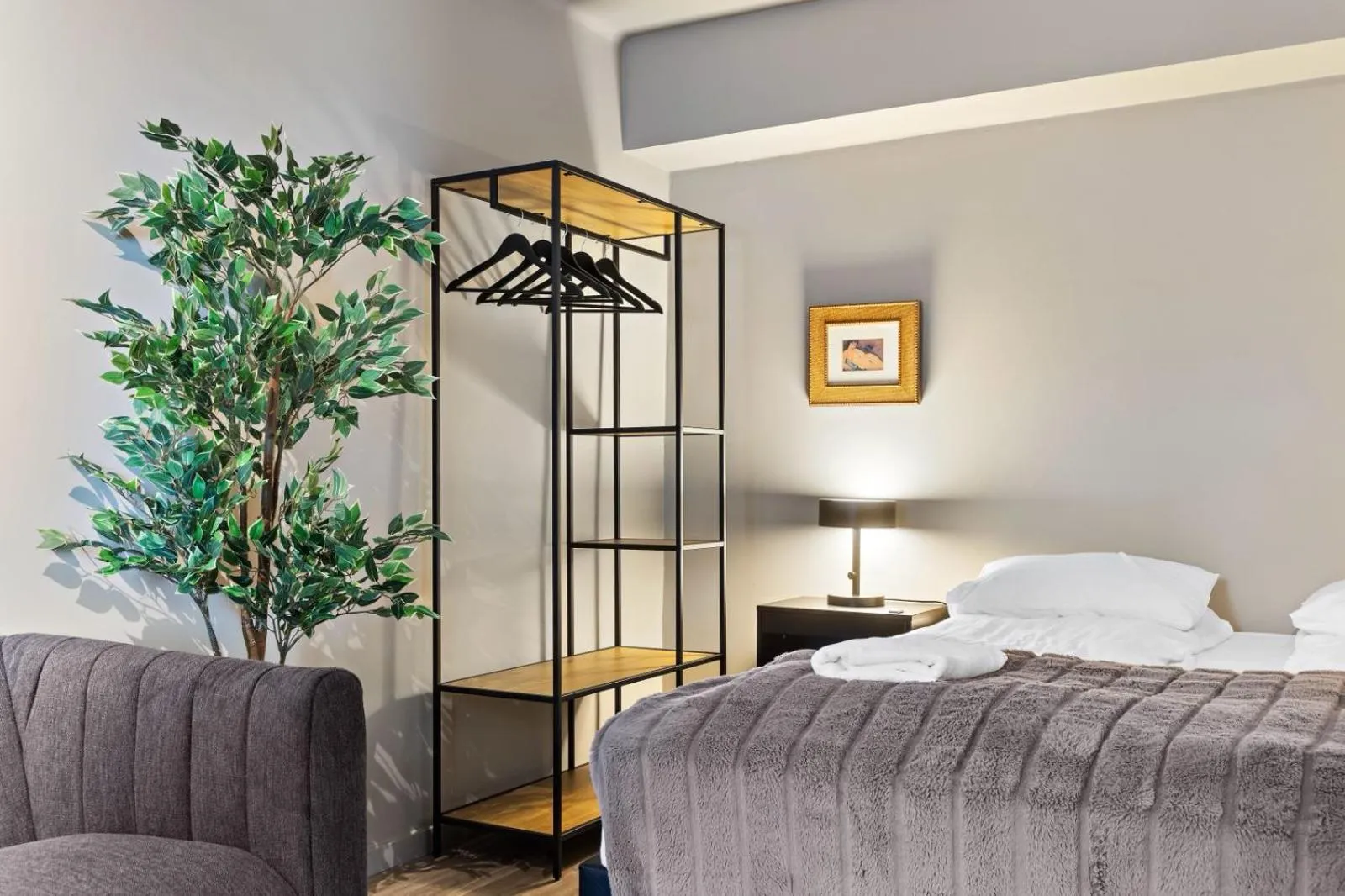 Bed in Astro Apartments