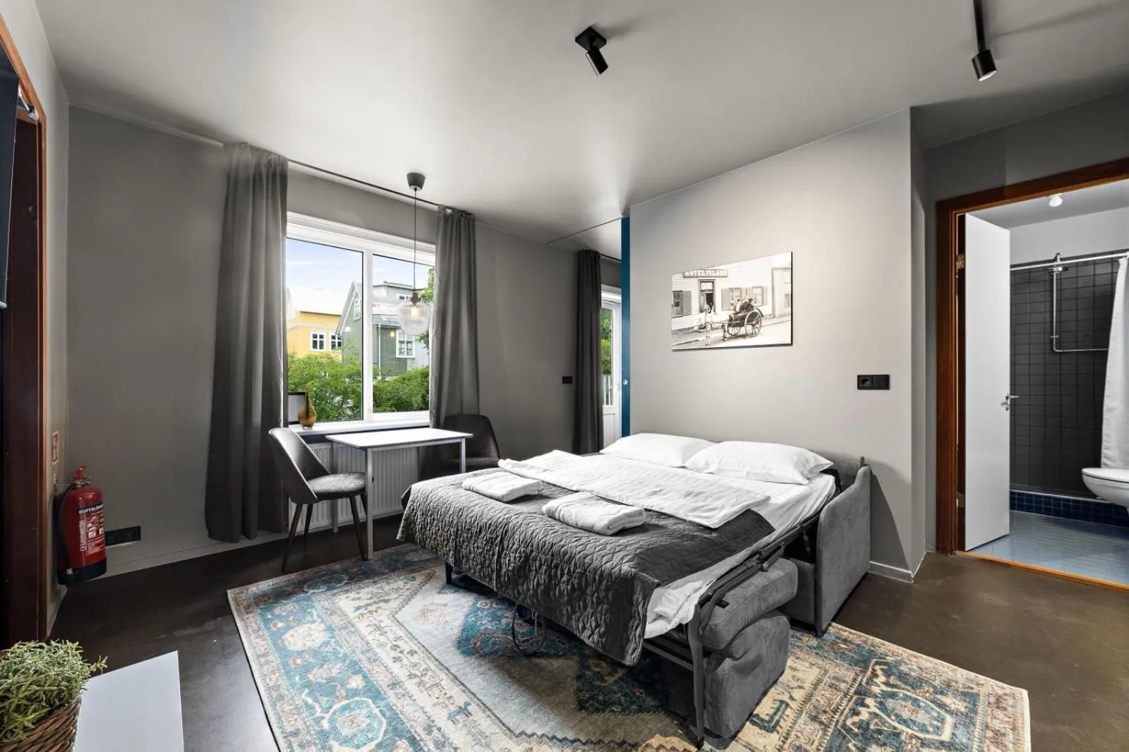 Bed in Astro Apartments