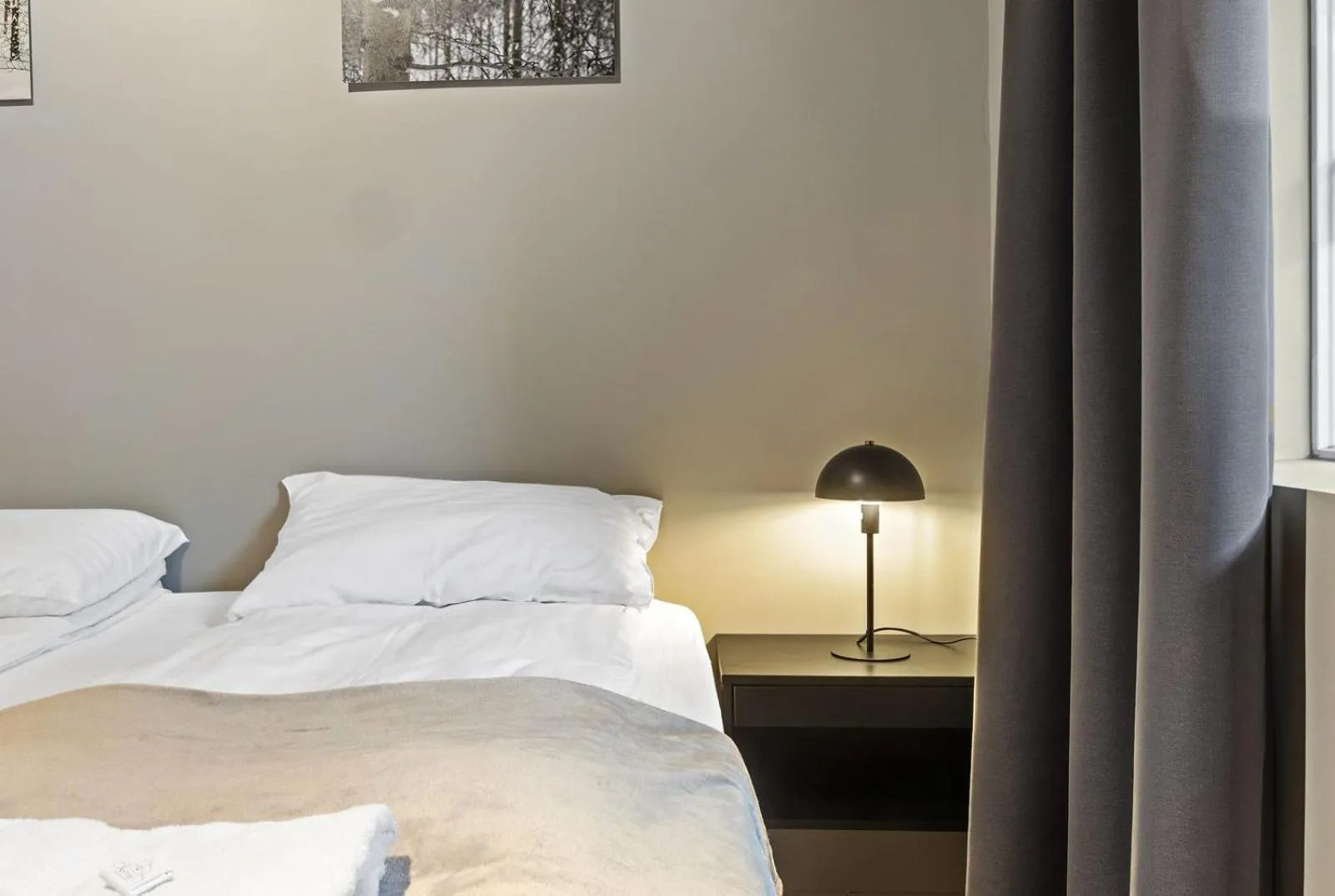 Bed in Astro Apartments