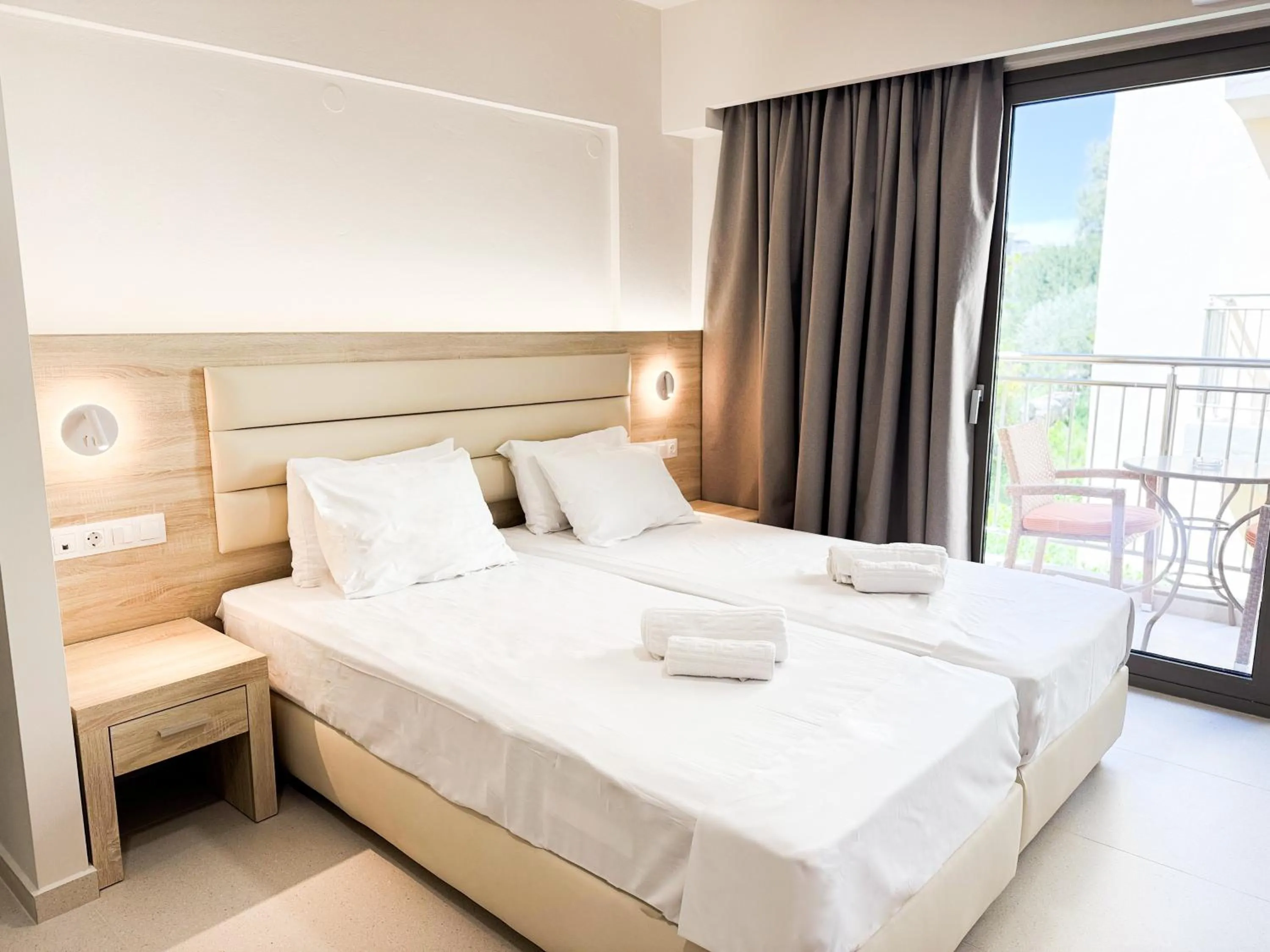 Bed in Acropolis Apartments