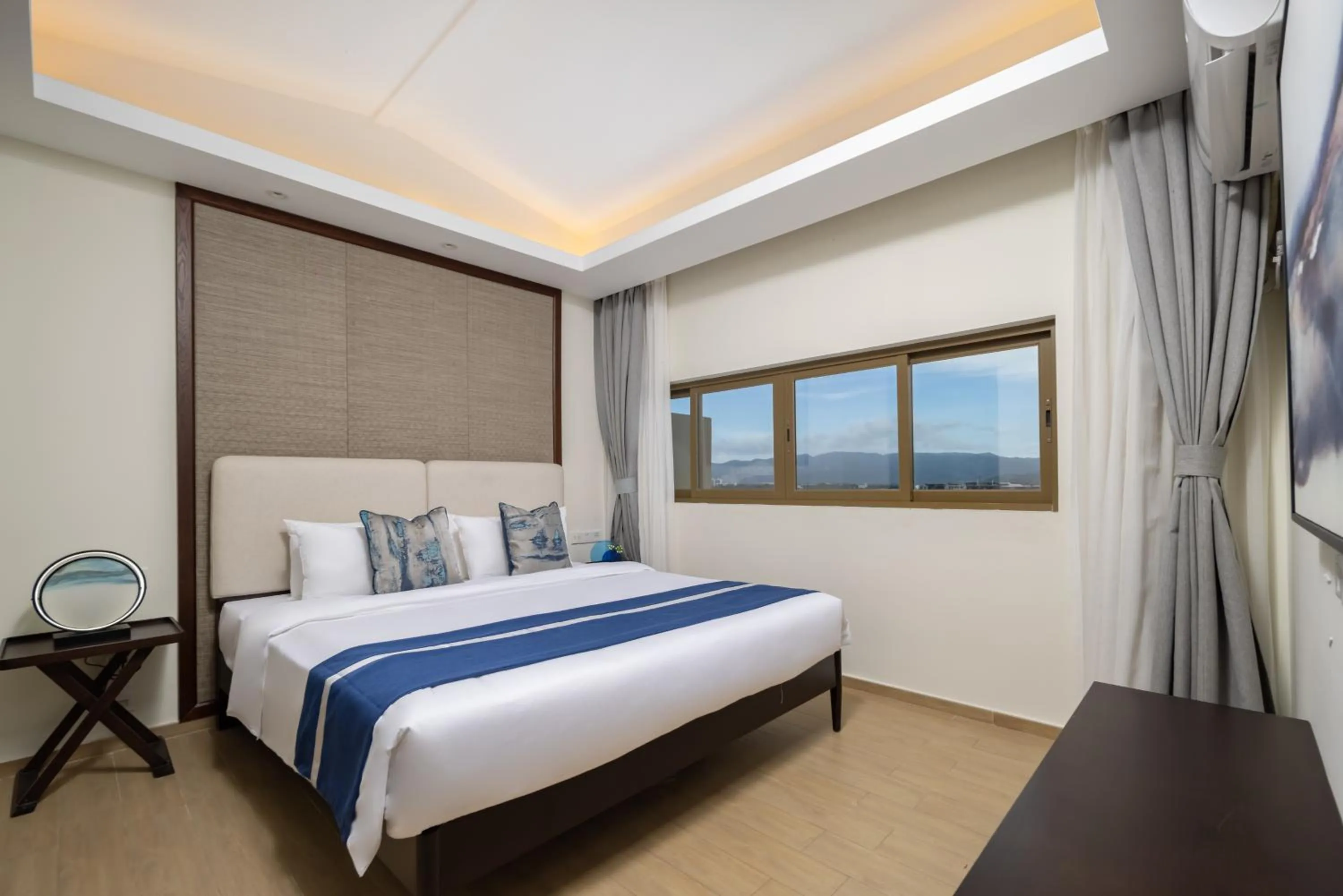 Bed in Iccssi Villa Haitang Bay Sanya