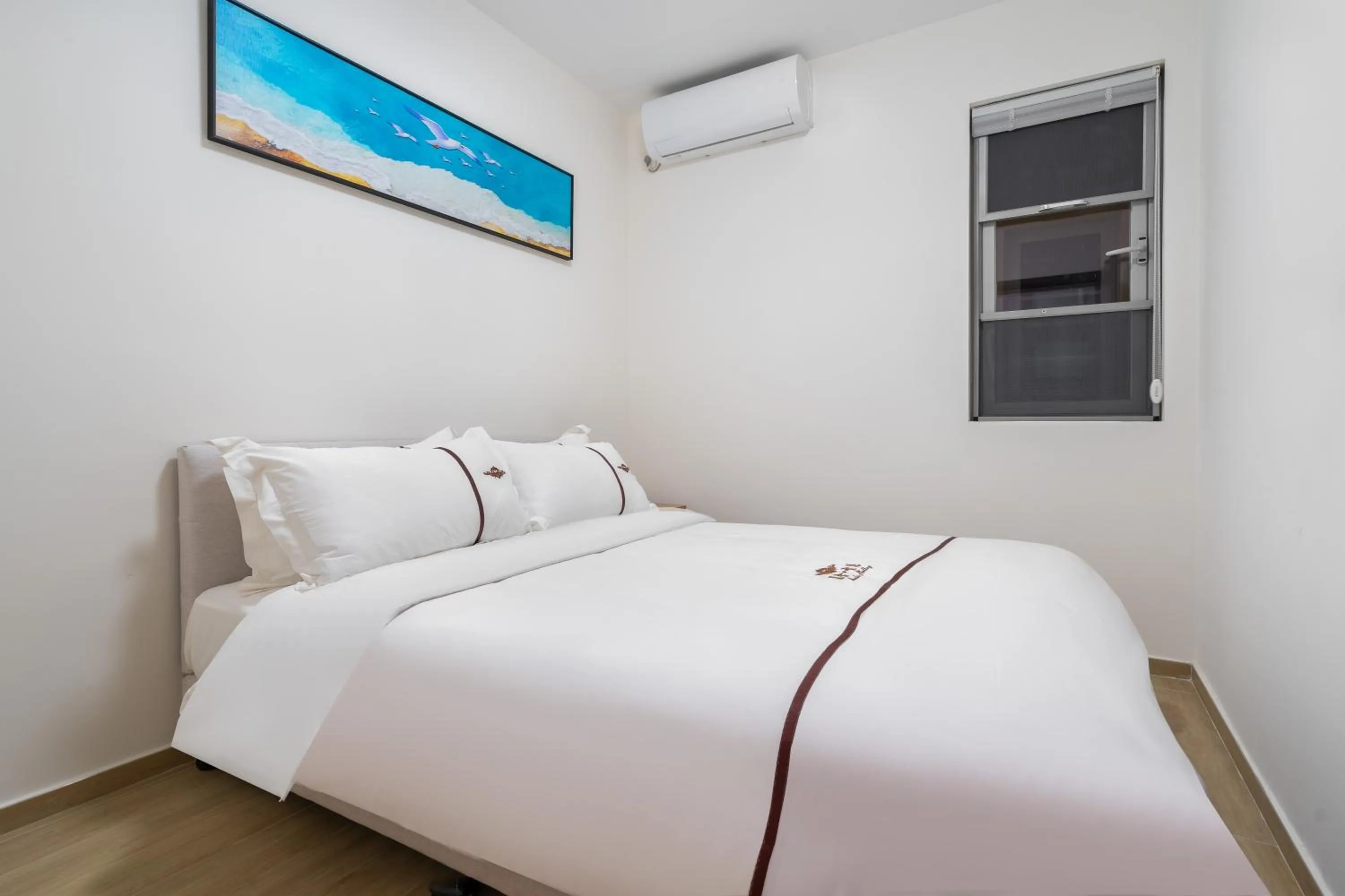 Bed in Iccssi Villa Haitang Bay Sanya