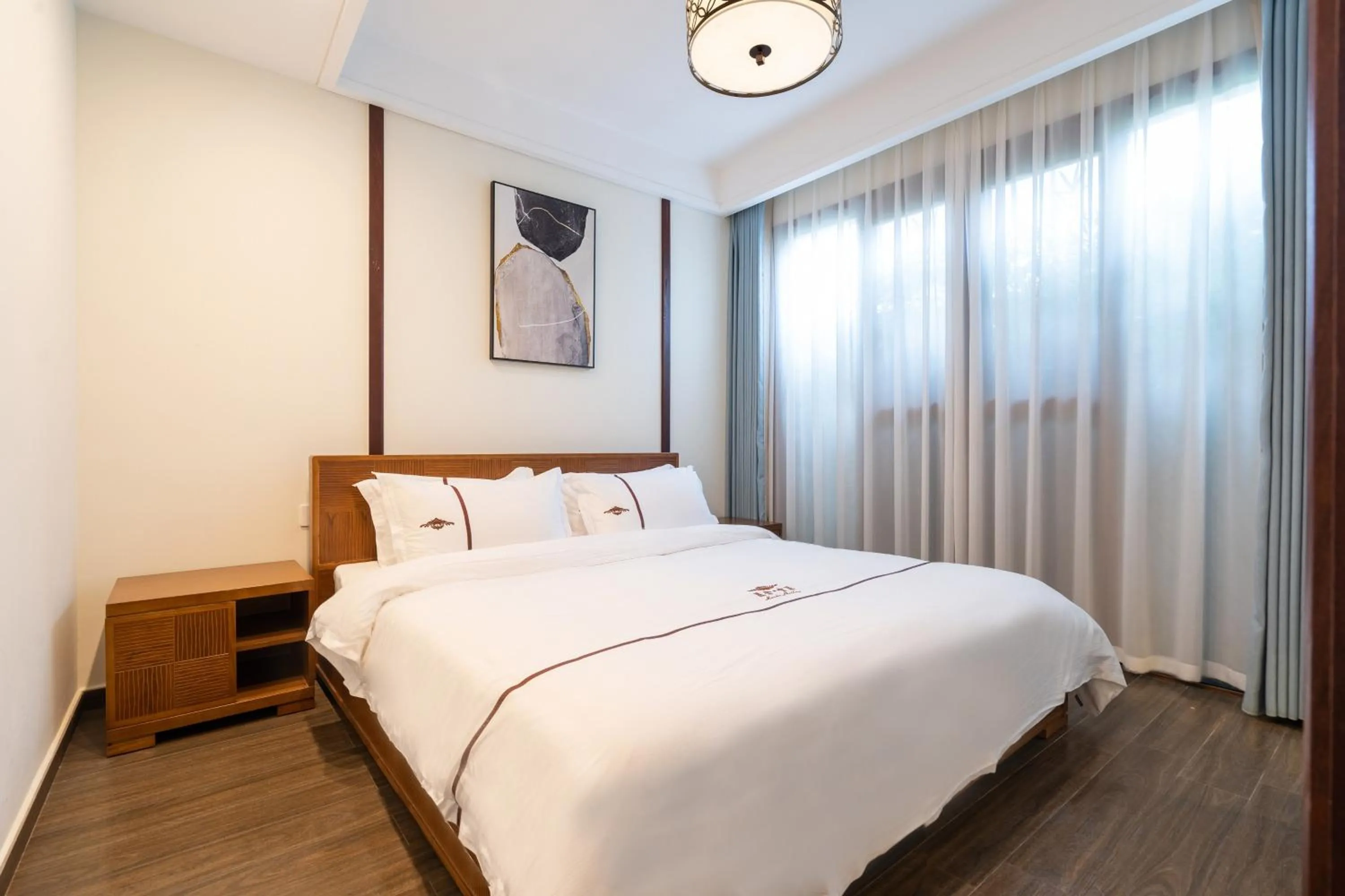 Bed in Iccssi Villa Haitang Bay Sanya