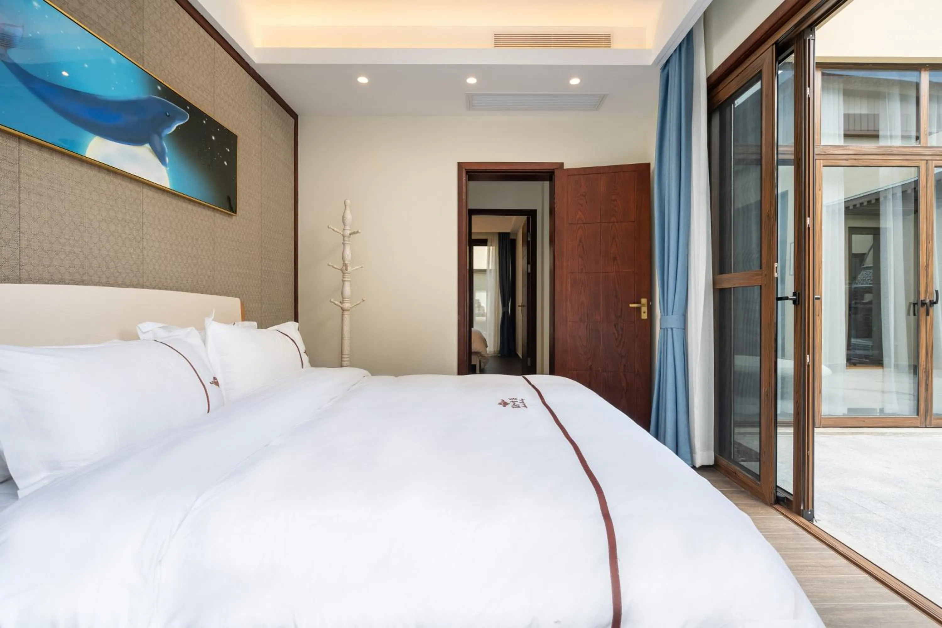 Bed in Iccssi Villa Haitang Bay Sanya