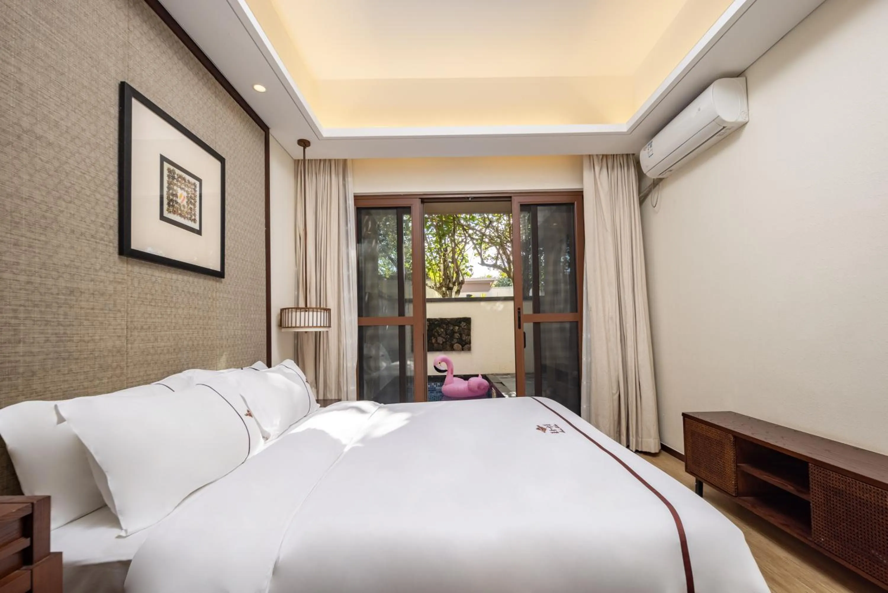 Bed in Iccssi Villa Haitang Bay Sanya